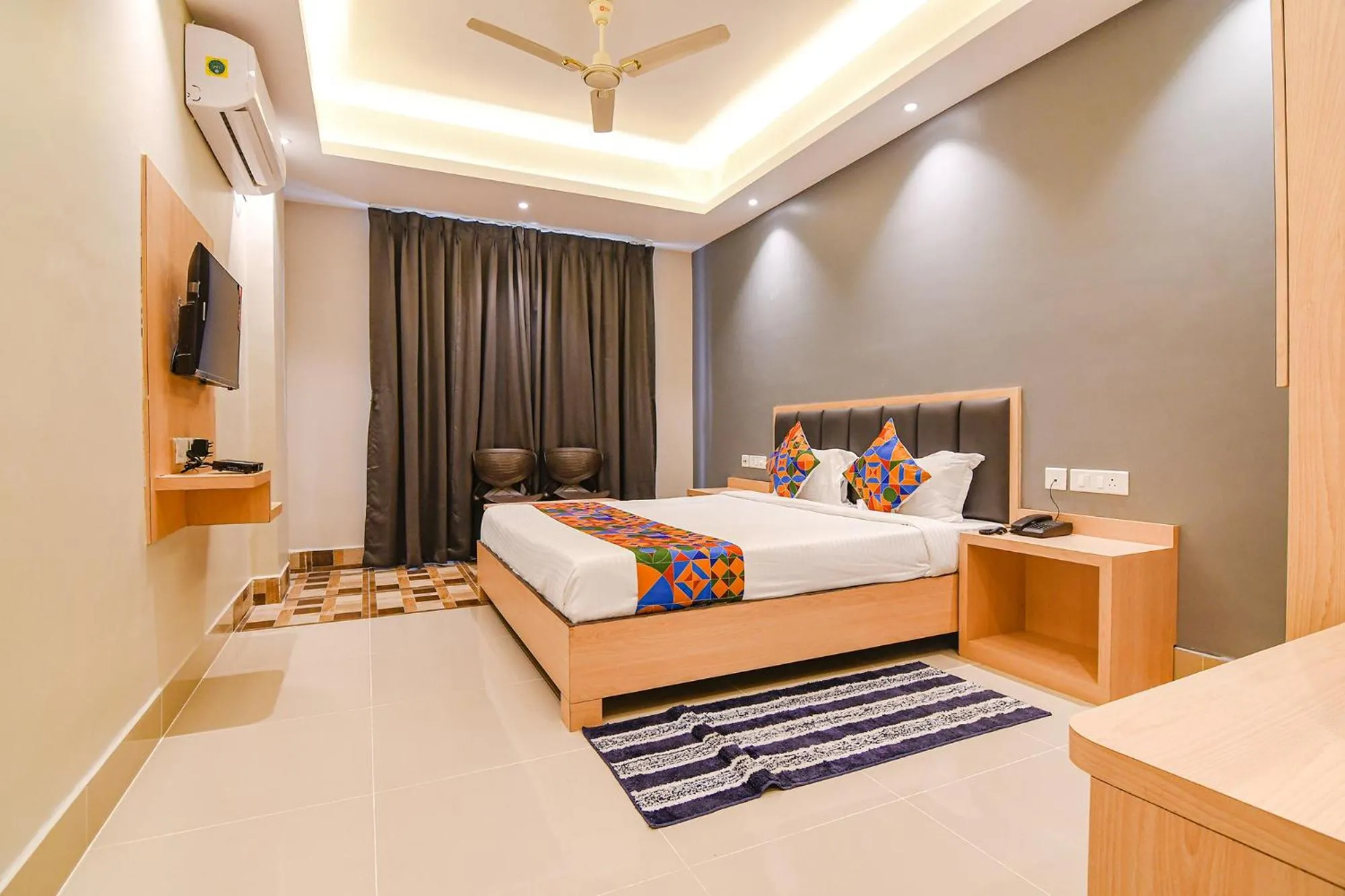 Bed in FabHotel JP - Nr Sataragachhi Railway Station