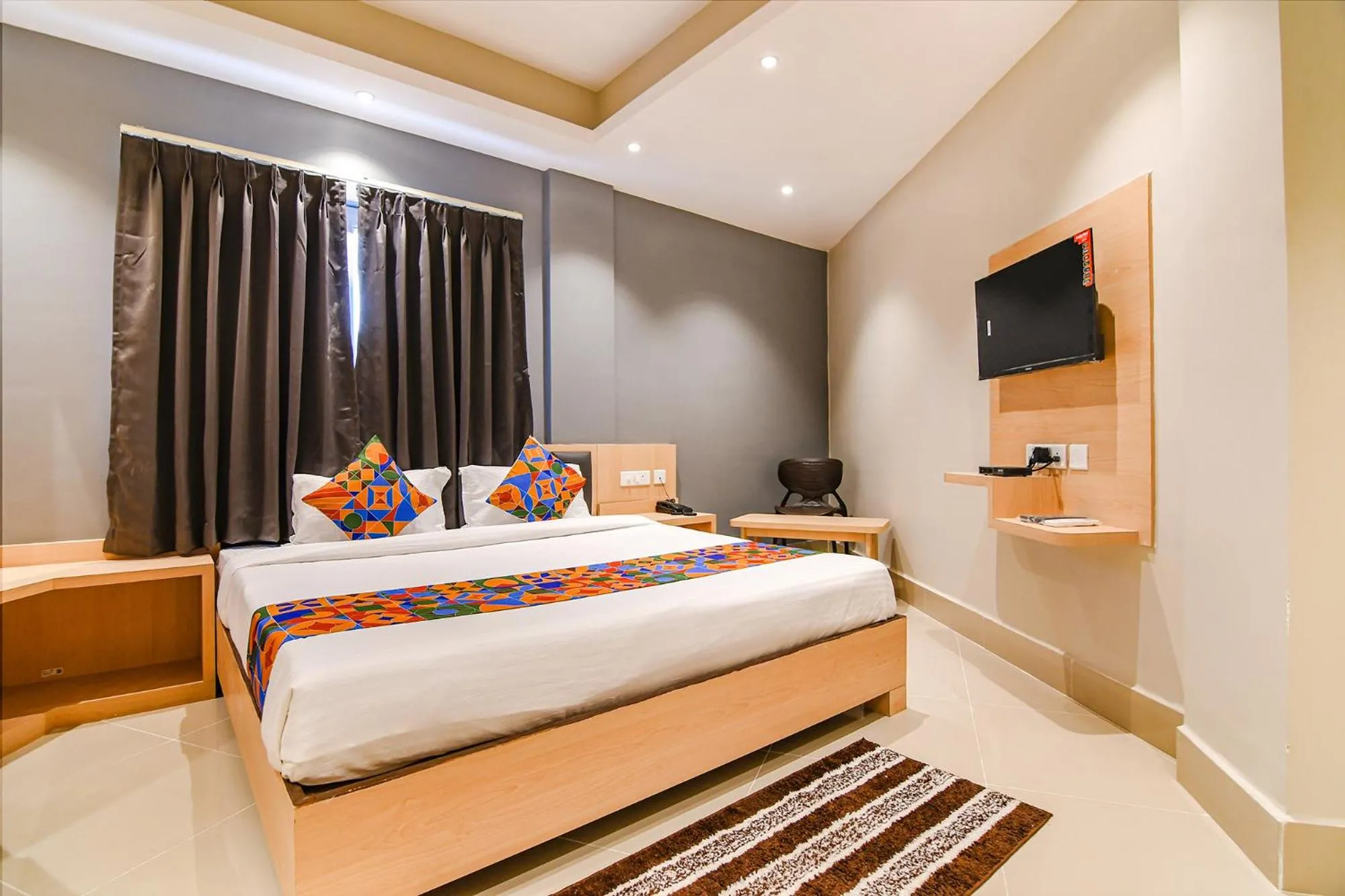 Bed in FabHotel JP - Nr Sataragachhi Railway Station