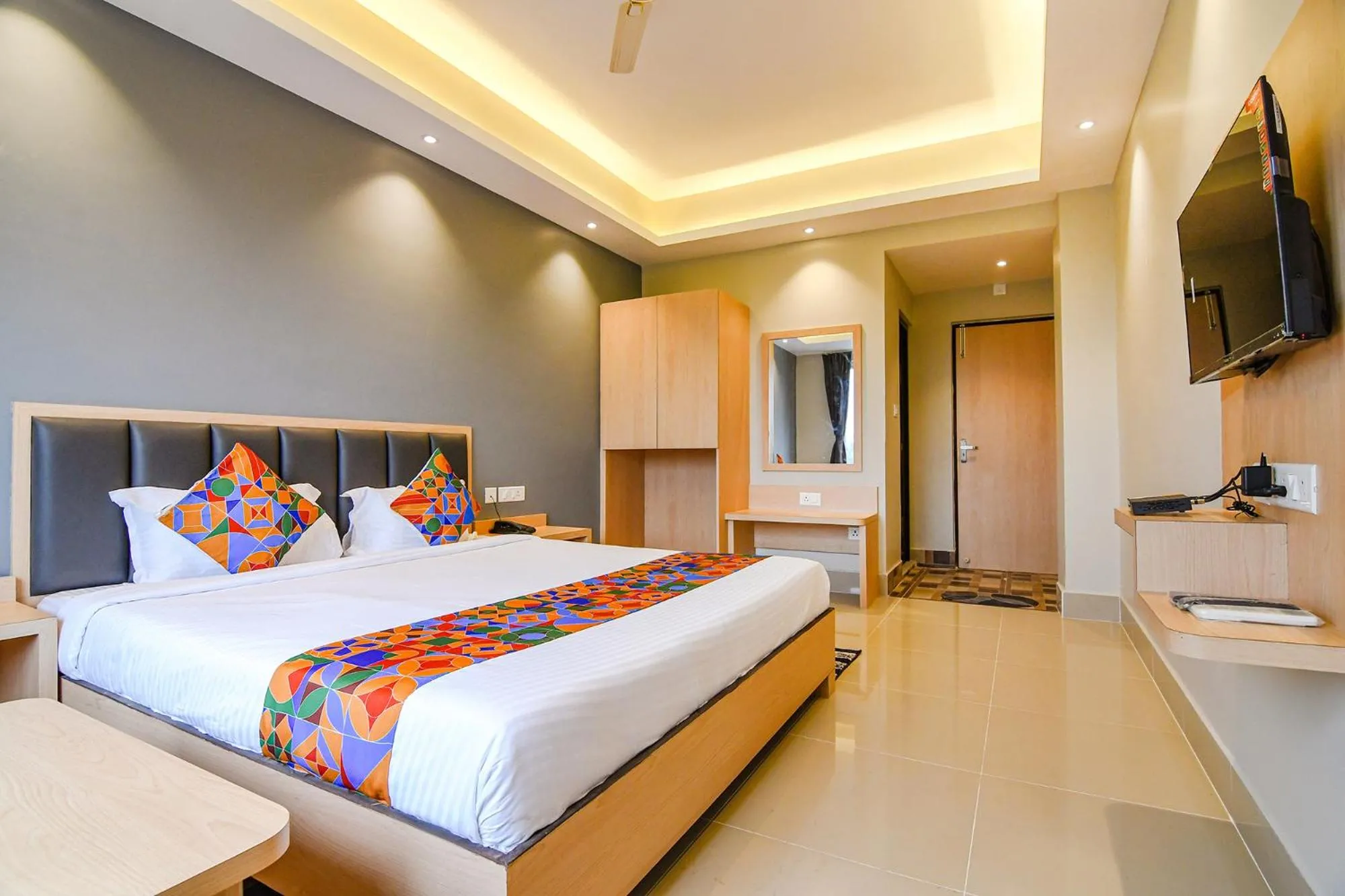 Bed in FabHotel JP - Nr Sataragachhi Railway Station