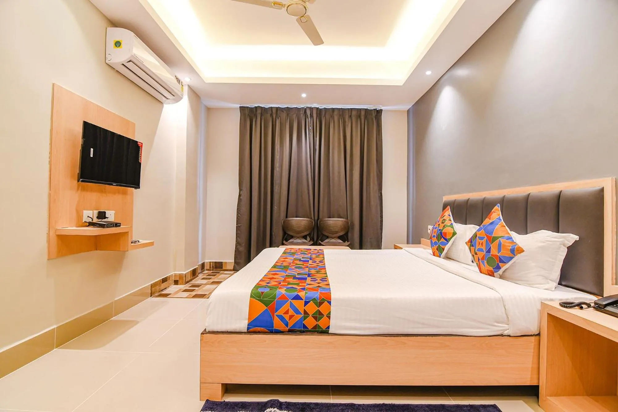 Bed in FabHotel JP - Nr Sataragachhi Railway Station