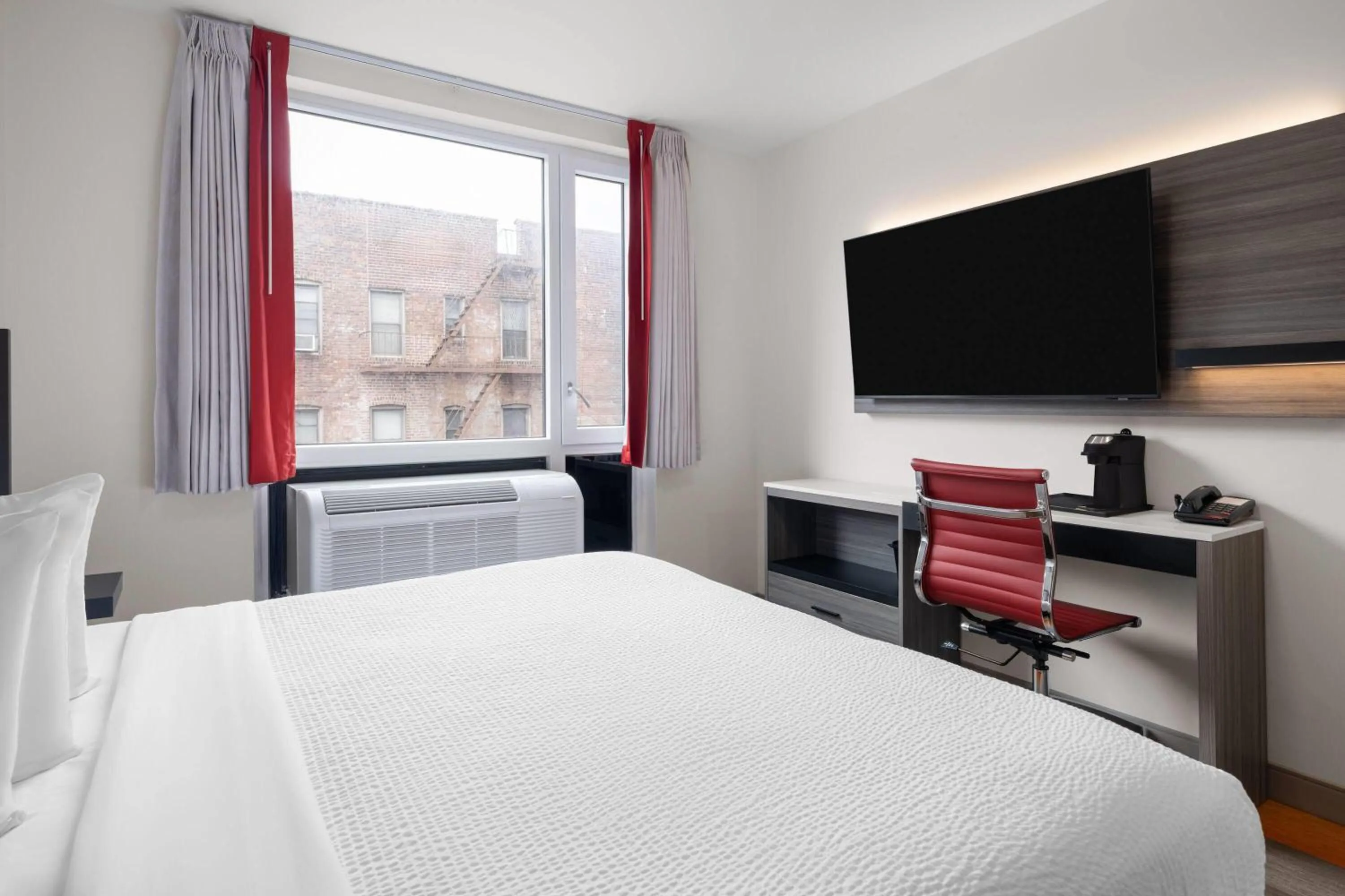 Photo of the whole room, Bed in Ramada by Wyndham Brooklyn Near Flatbush
