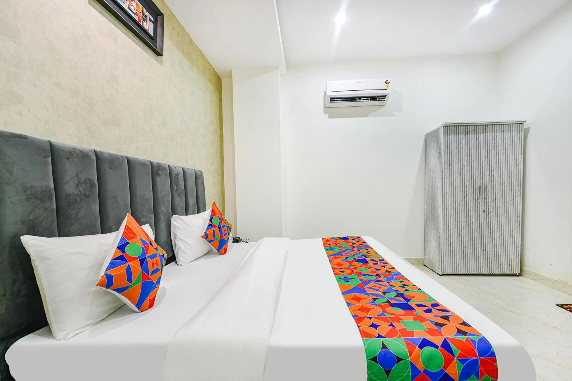 Bed in FabHotel Kavya Inn - Nr The Mall of Faridabad