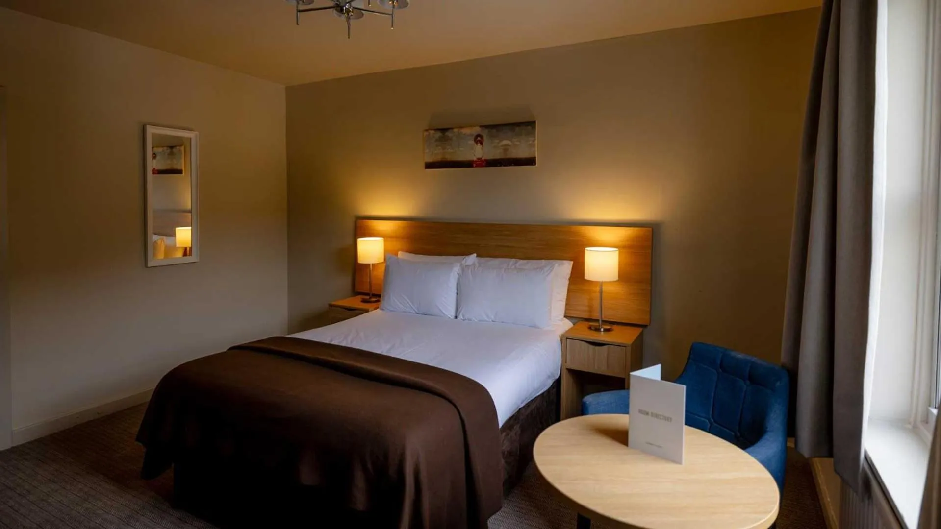 Bed in The Tarbet Hotel