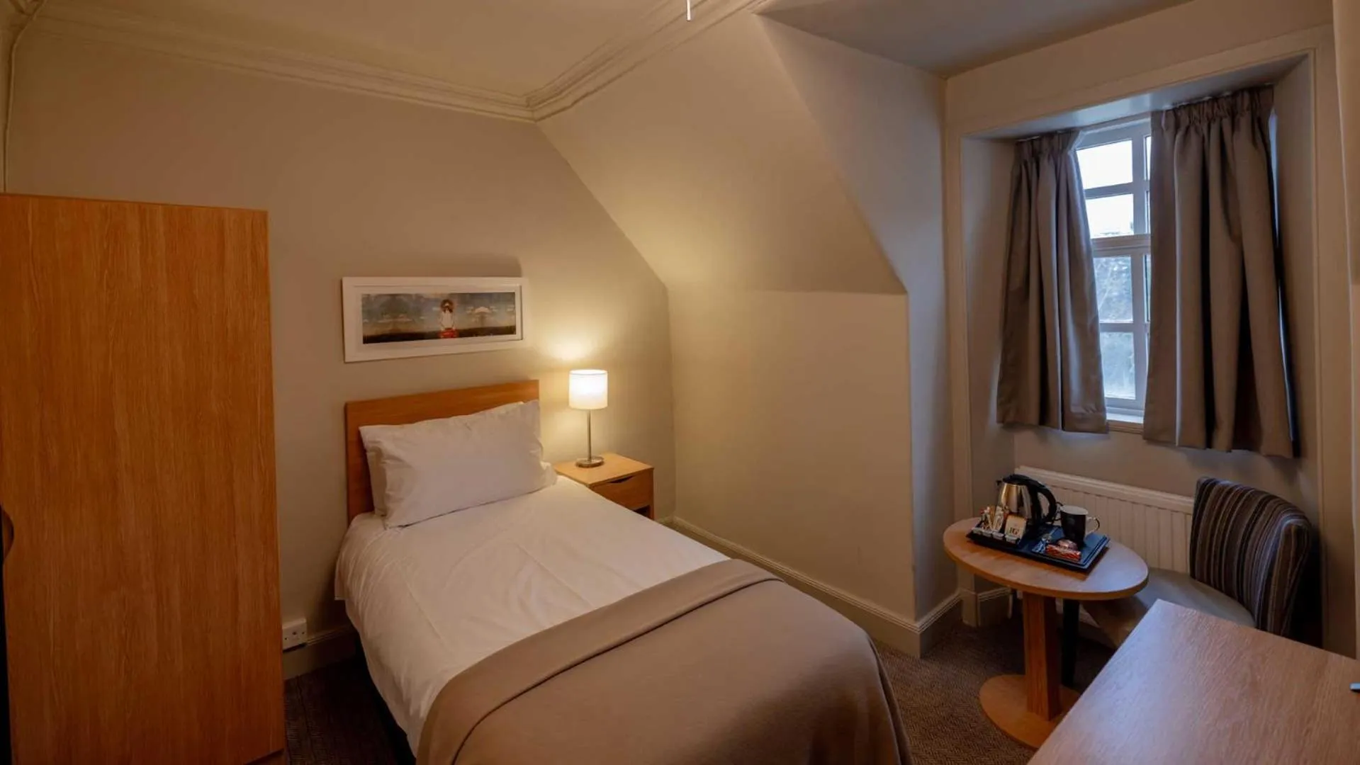 Bed in The Tarbet Hotel