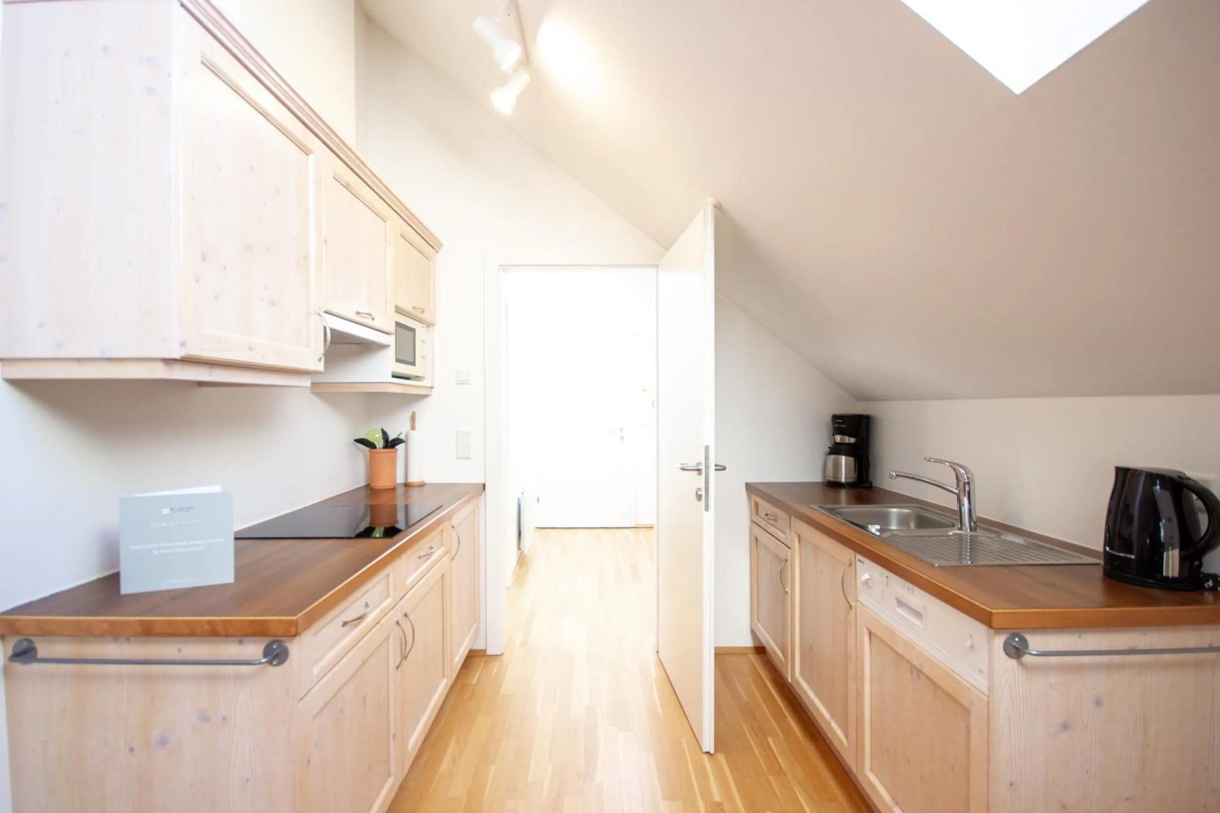 Kitchen or kitchenette in Appartements Stranach