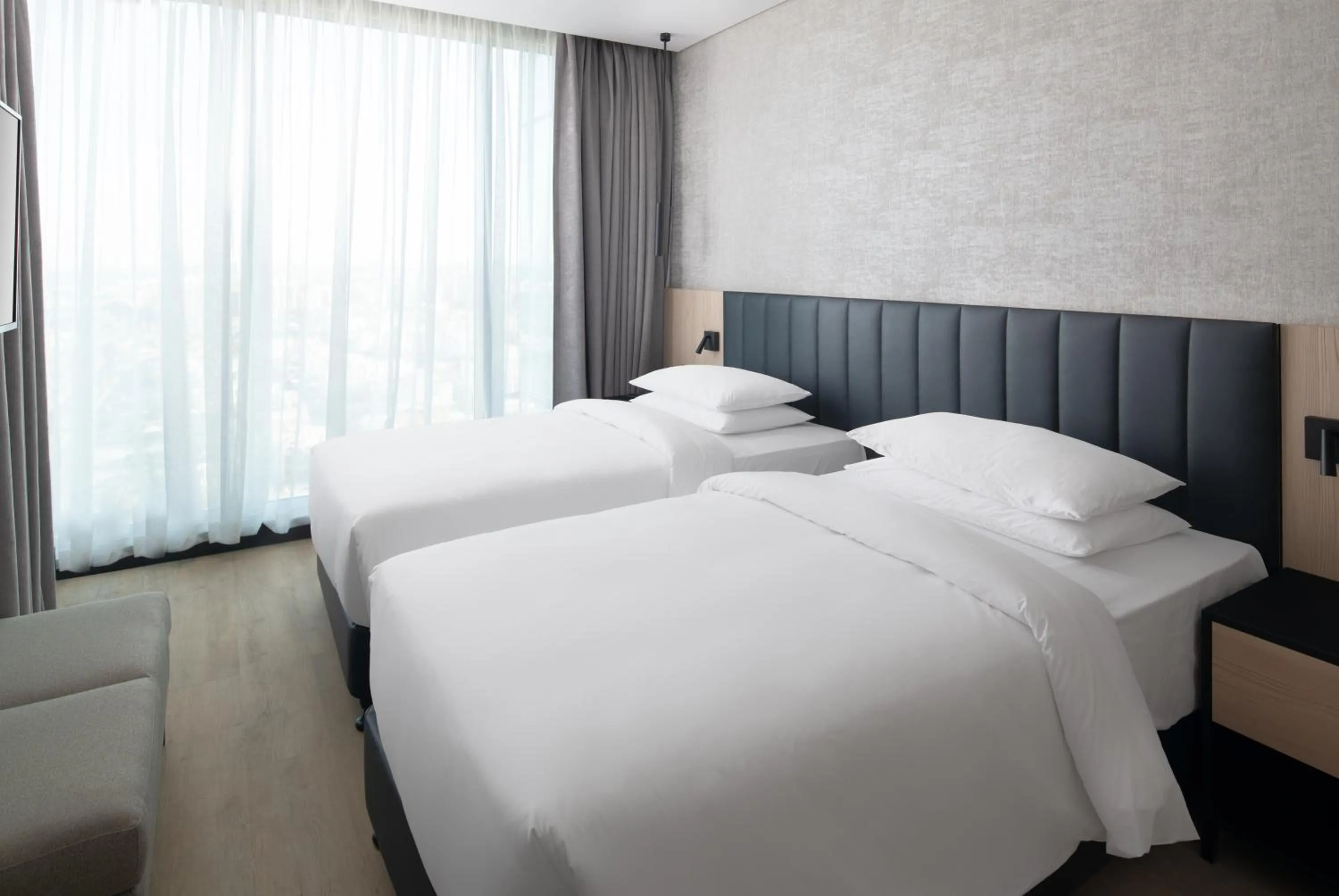 Bed in Park Inn by Radisson Hotel & Apartments Kuwait