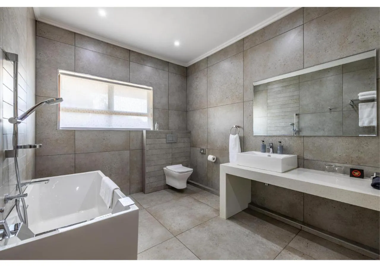 Shower in Sheppard Boutique Hotel