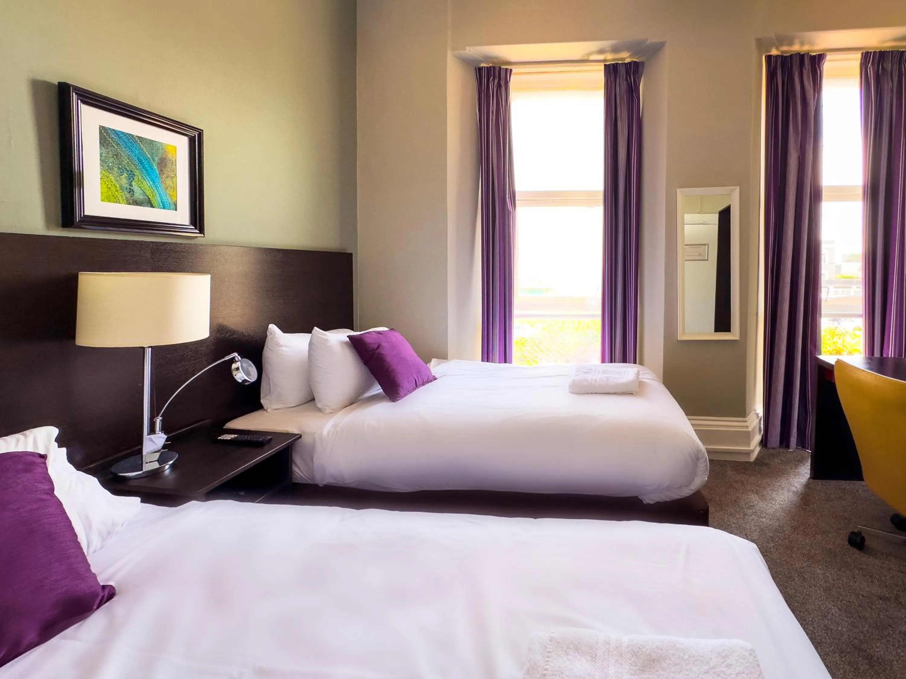 Bed in The Esplanade Hotel by Compass Hospitality