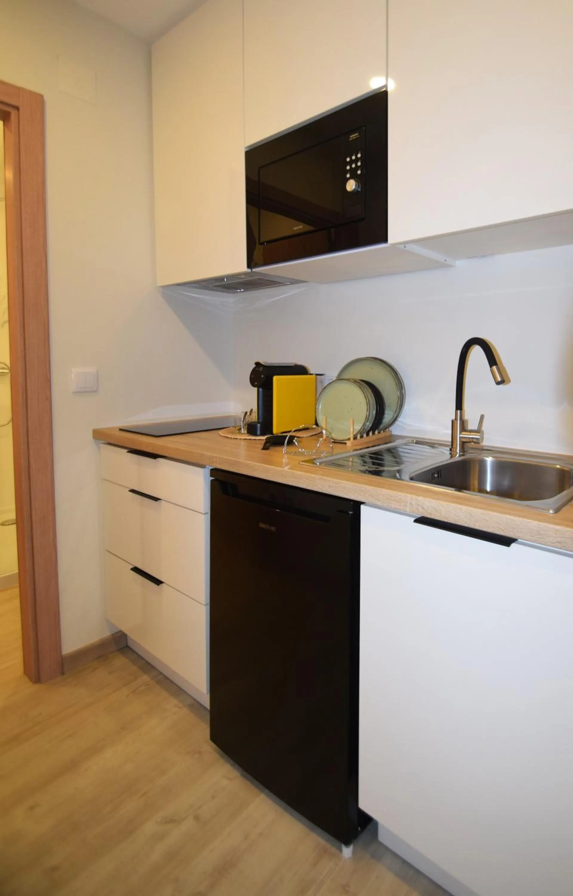 Kitchen or kitchenette in SIENNA Hotel