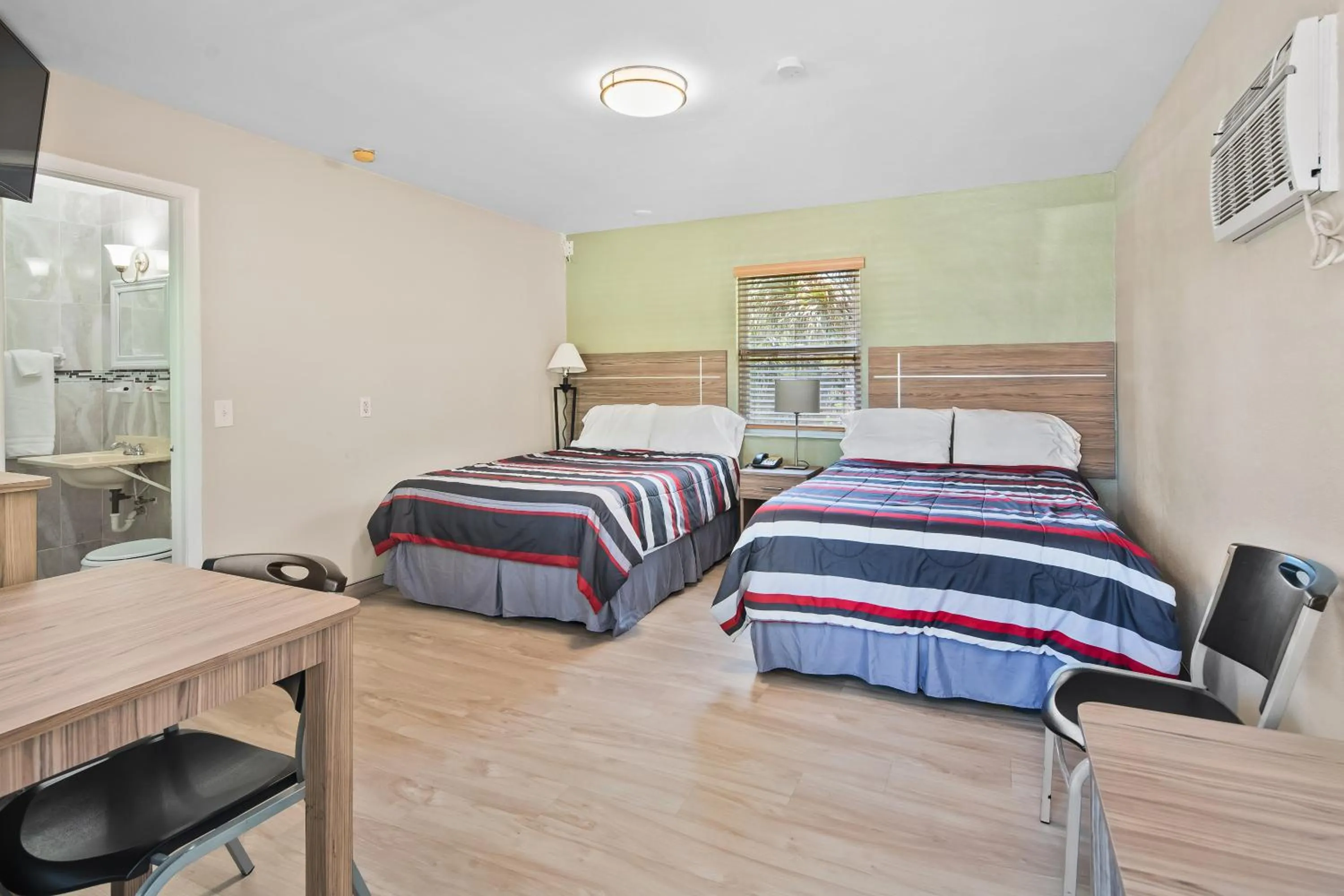 Bed in Tamiami Motel