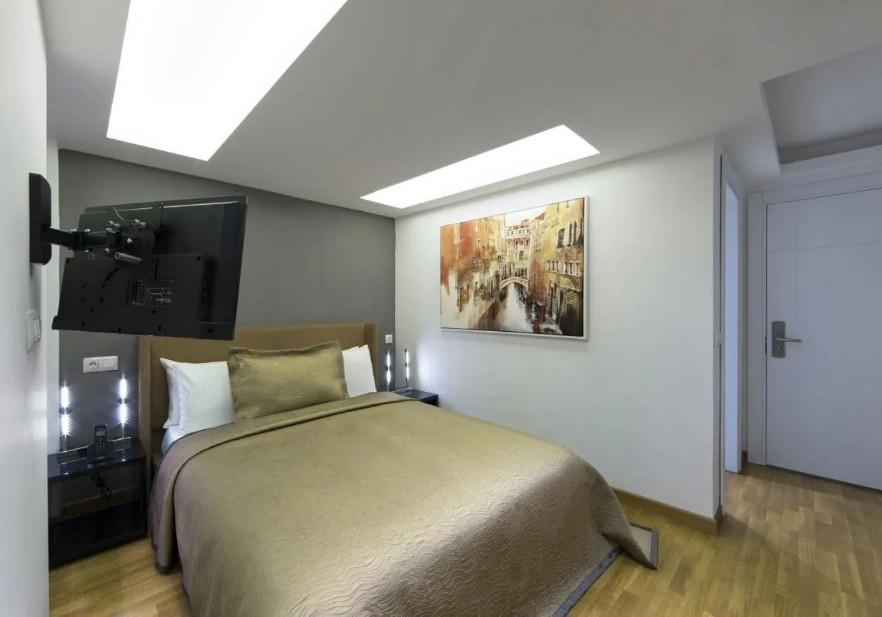 Bed in The Place Suit & Apartments