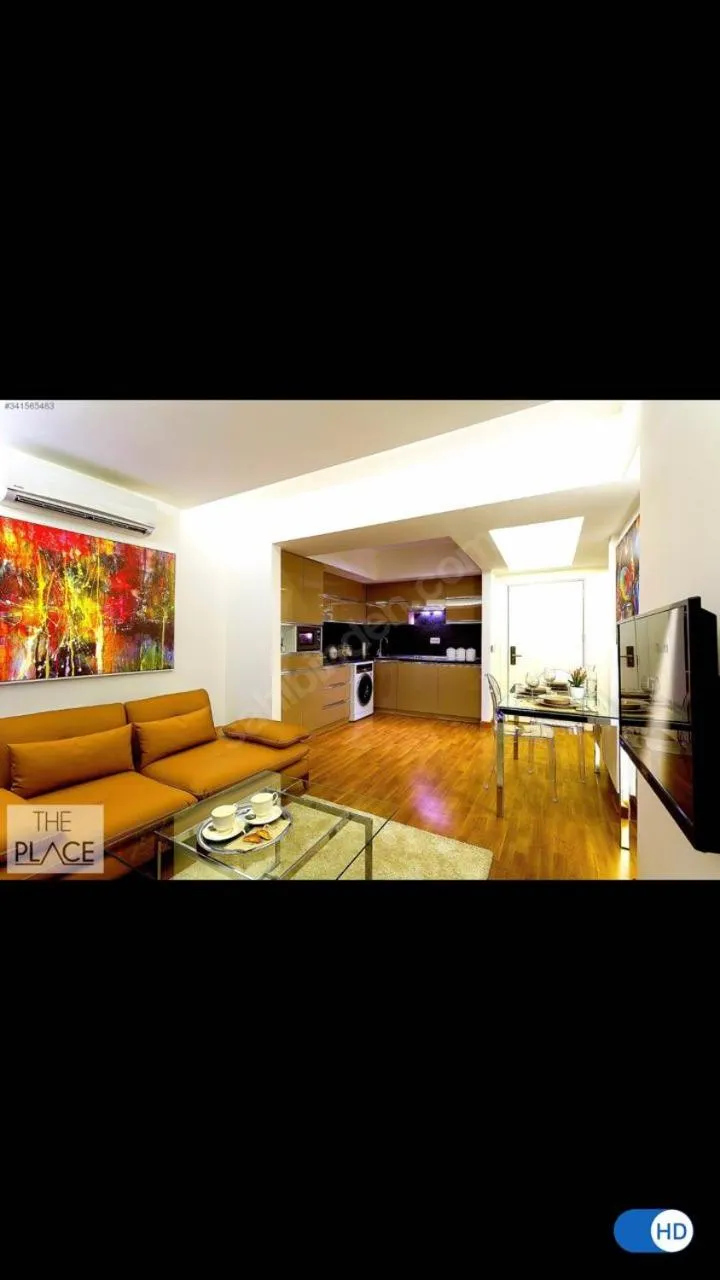 Communal lounge/ TV room in The Place Suit & Apartments