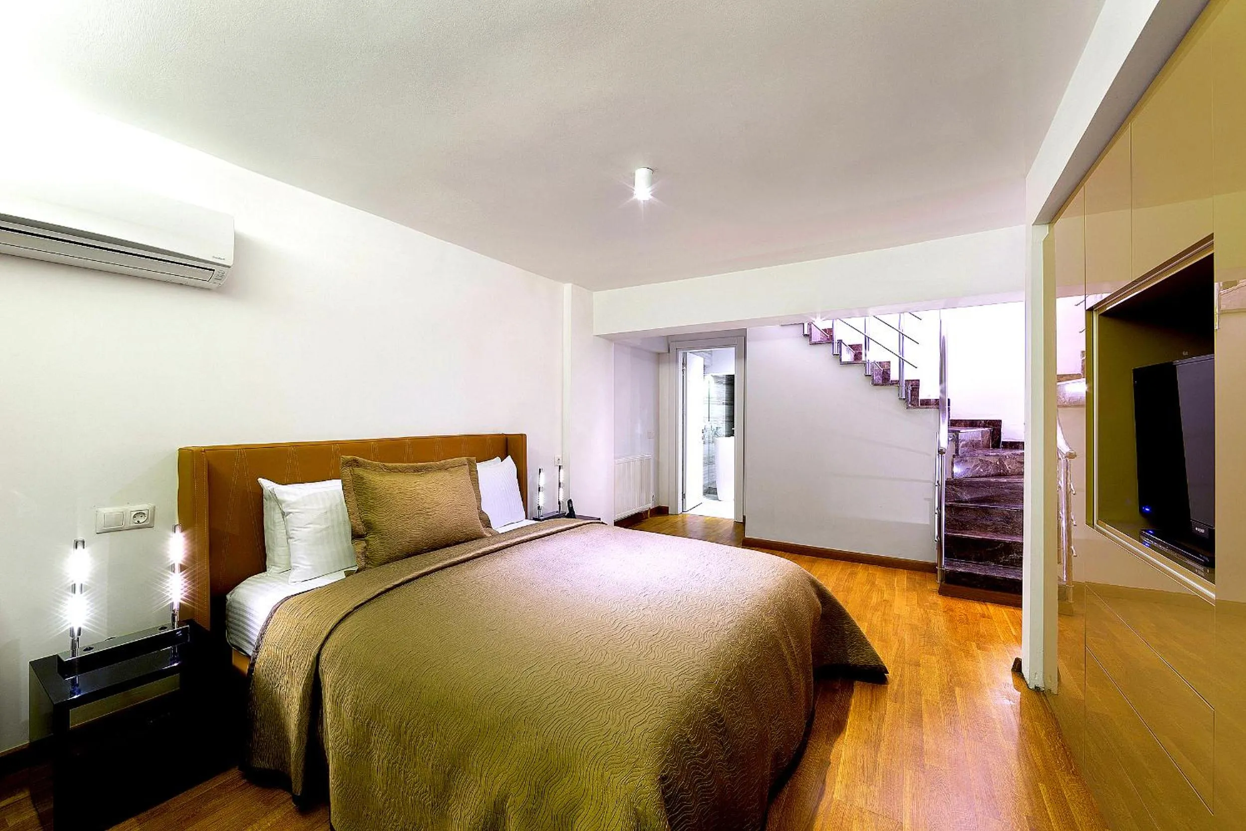 Bed in The Place Suit & Apartments