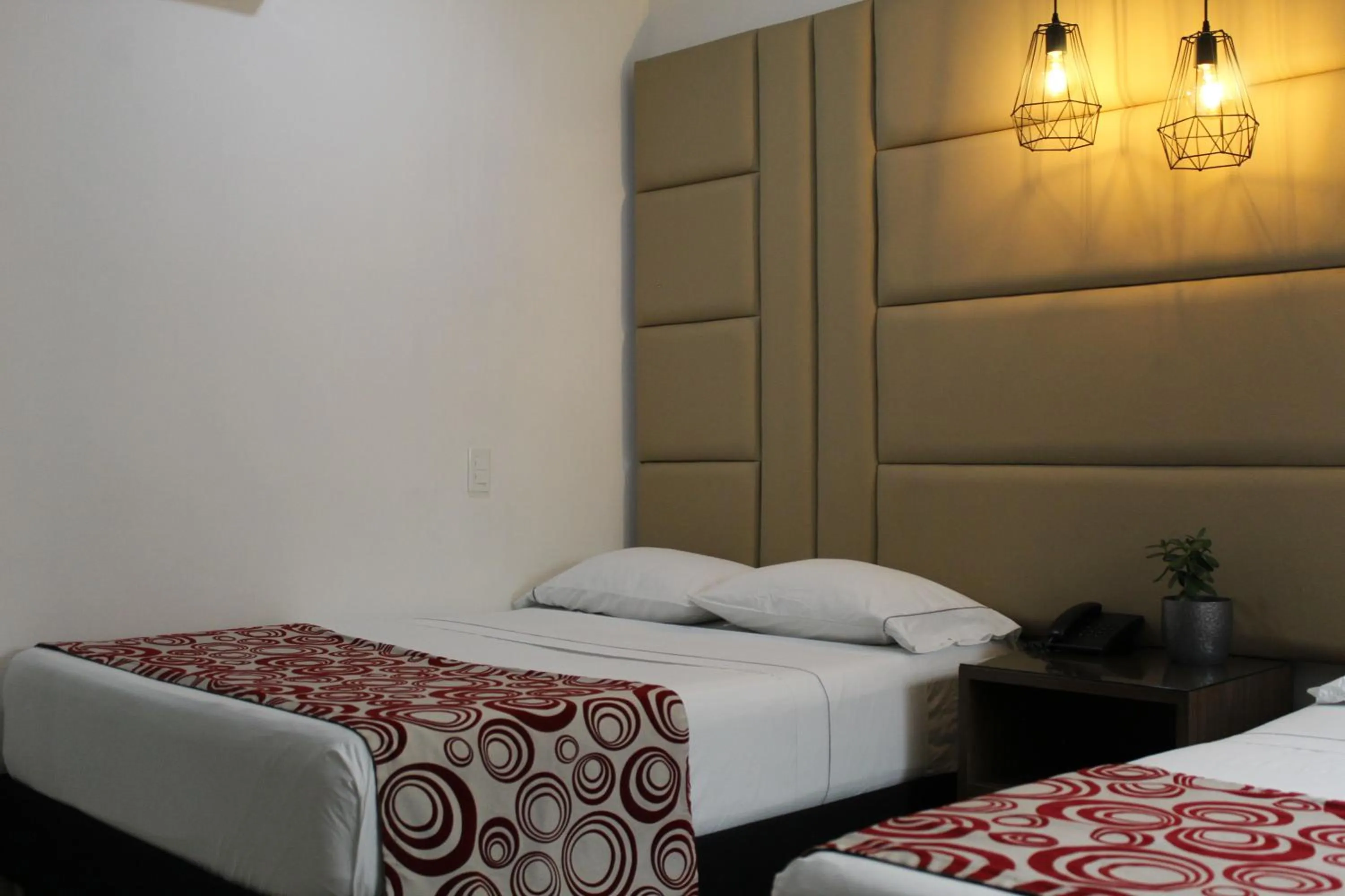 Bed in Hotel Merlott Lleras