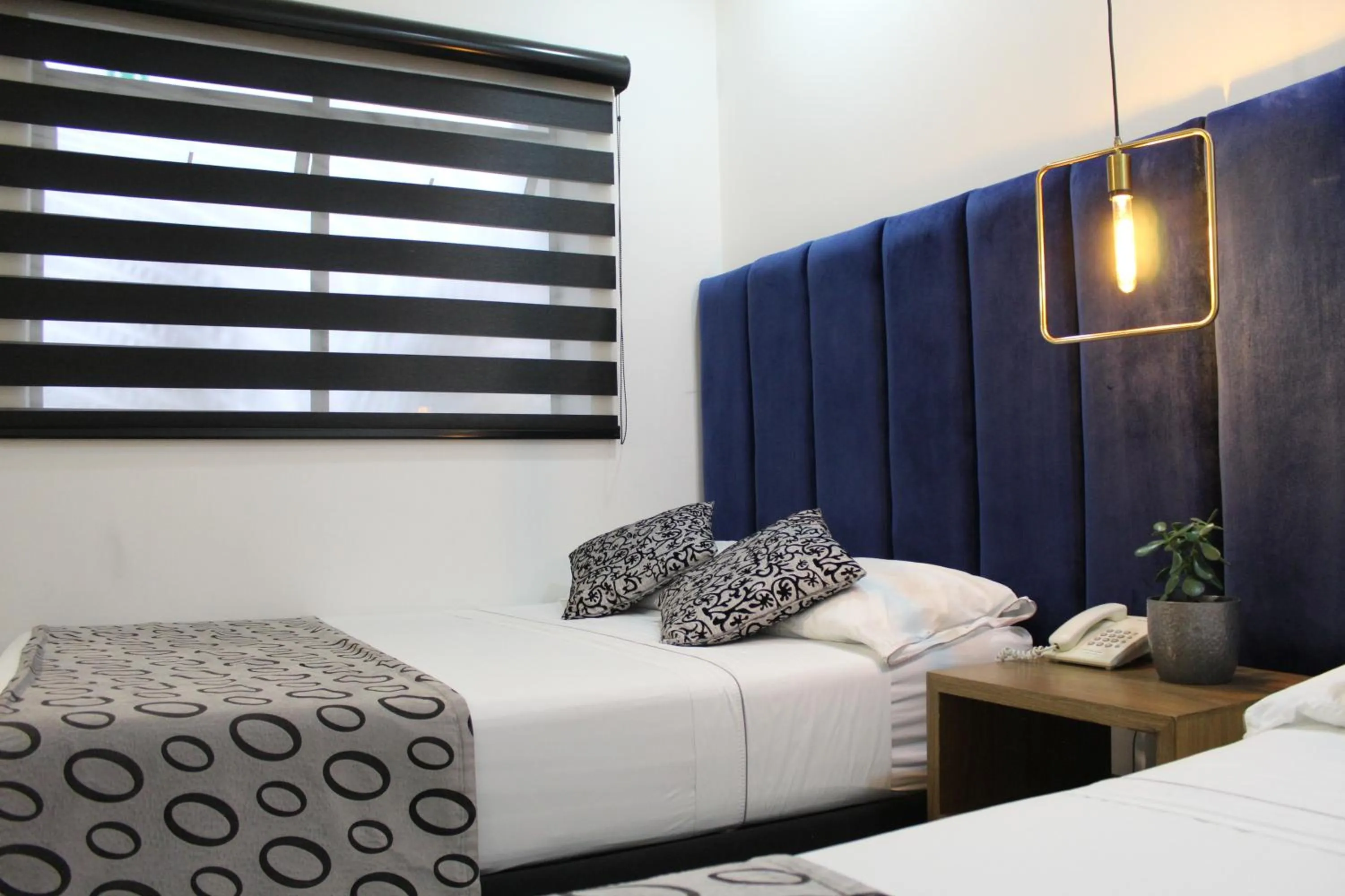 Bed in Hotel Merlott Lleras