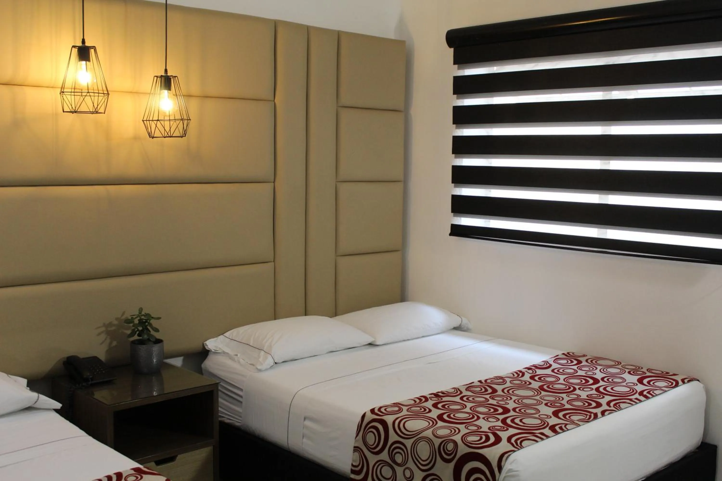 Bed in Hotel Merlott Lleras