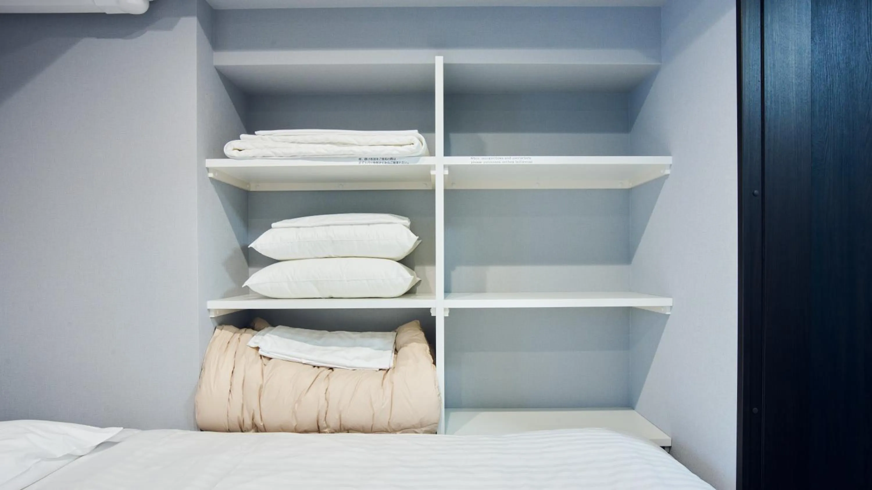 Bed in Vacation Rental Hotel TENMONKAN