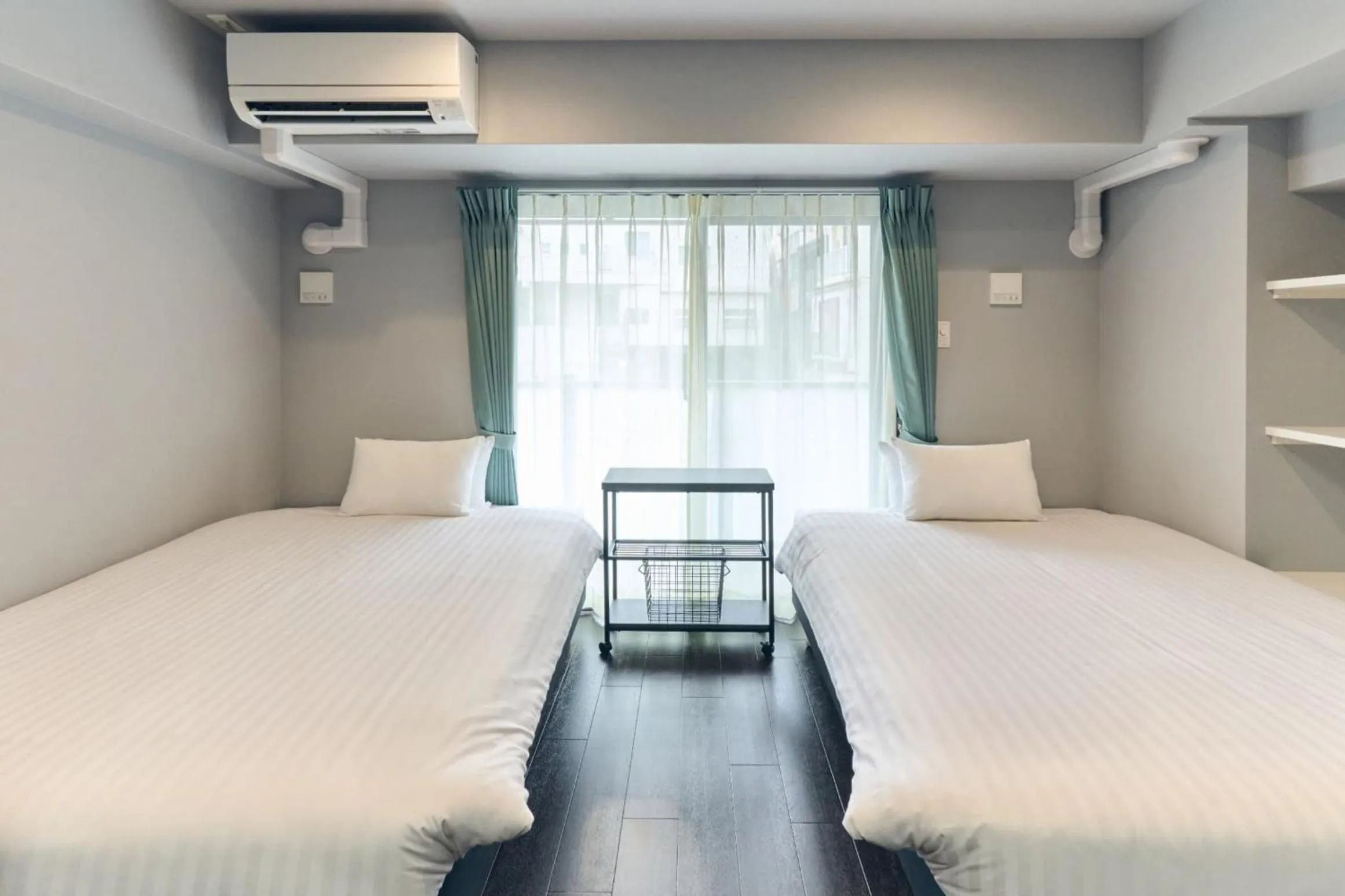 Bed in Vacation Rental Hotel TENMONKAN