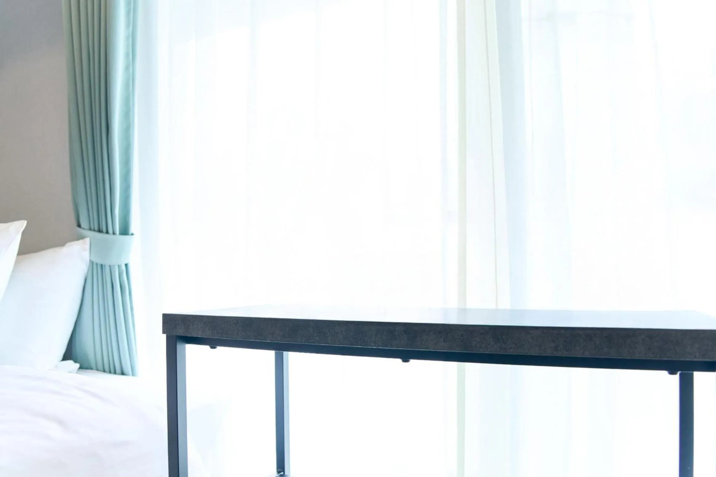 Bed in Vacation Rental Hotel TENMONKAN