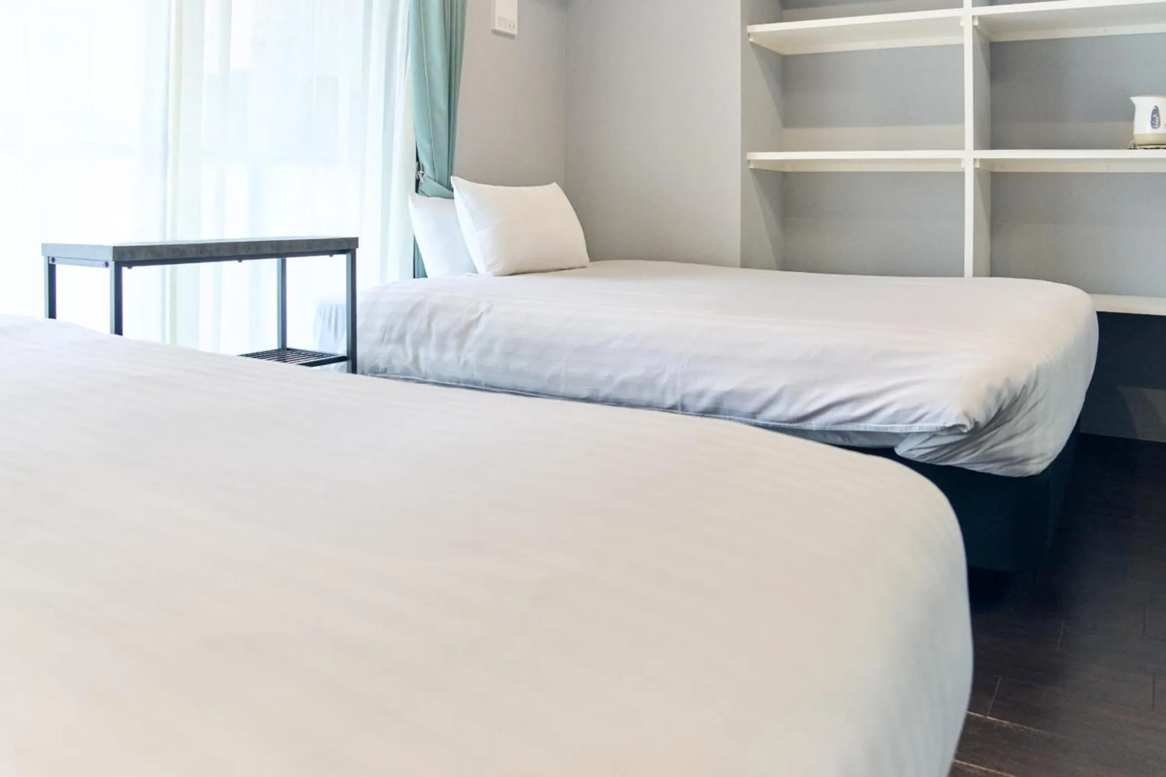 Bed in Vacation Rental Hotel TENMONKAN