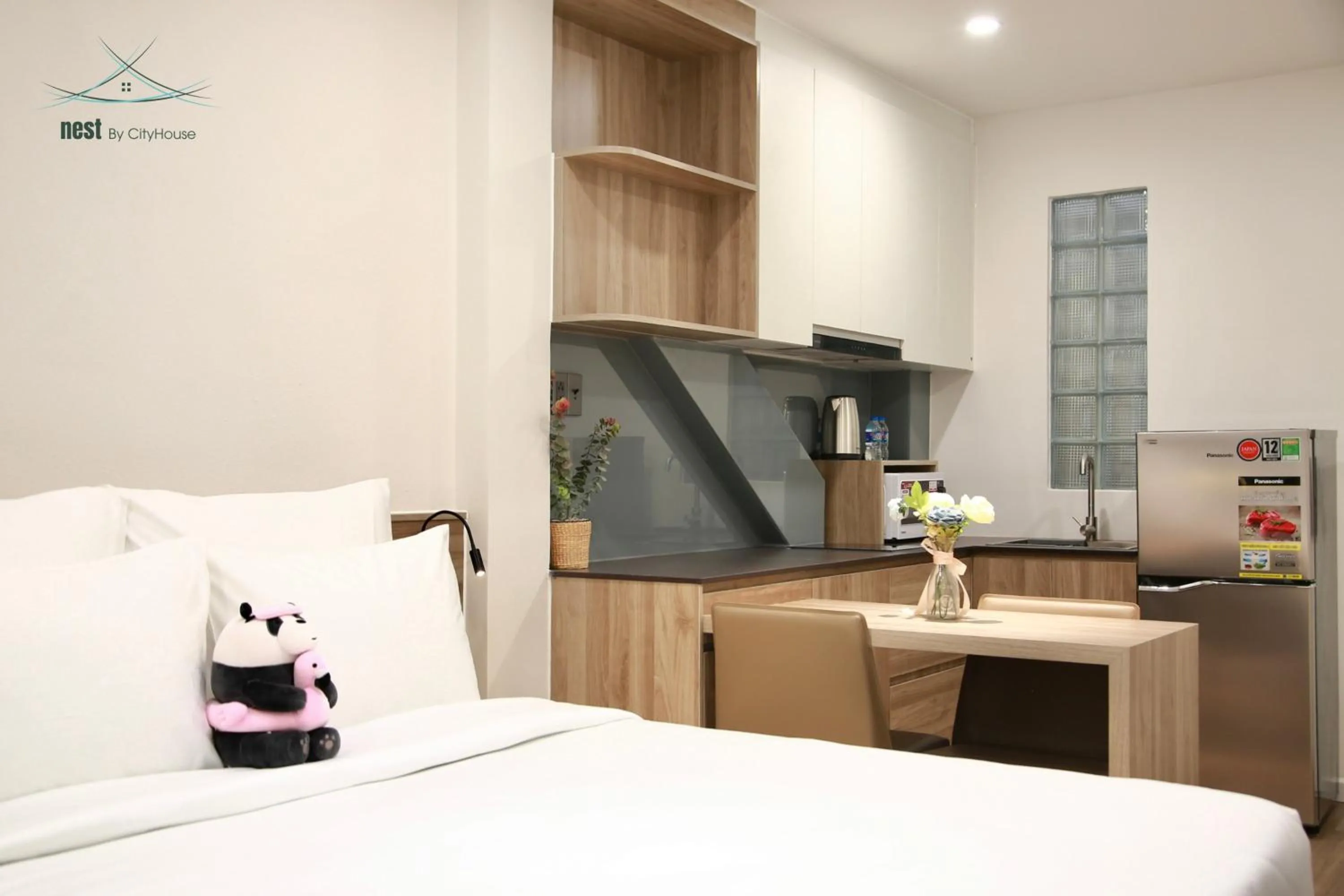 Photo of the whole room, Bed in Cityhouse - Nest Minh Khai