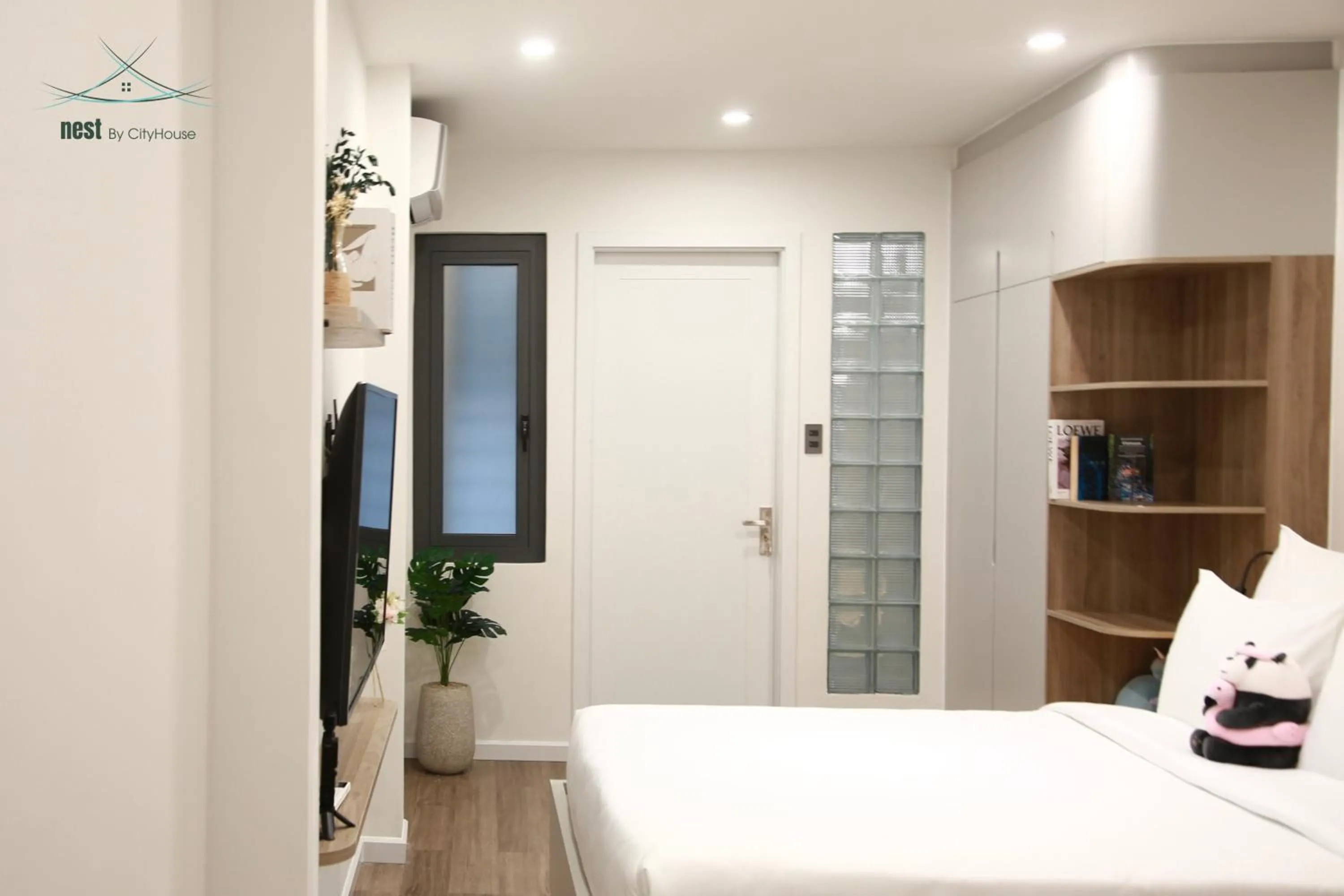 Photo of the whole room, Bed in Cityhouse - Nest Minh Khai