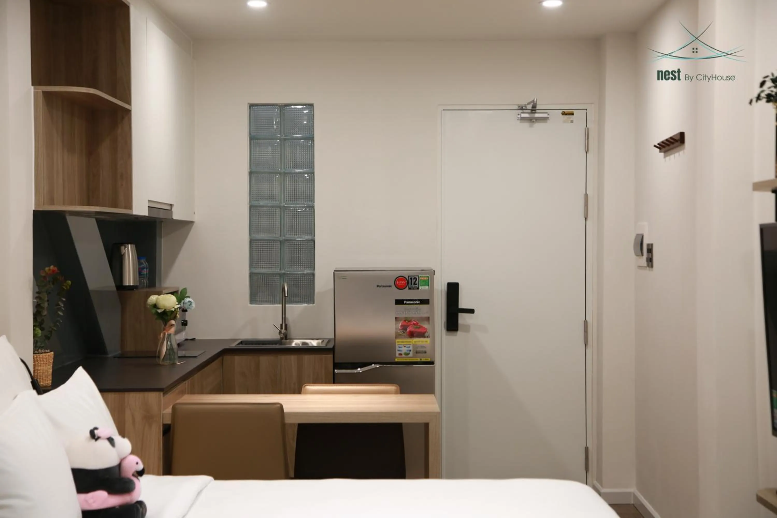 Photo of the whole room, Bed in Cityhouse - Nest Minh Khai