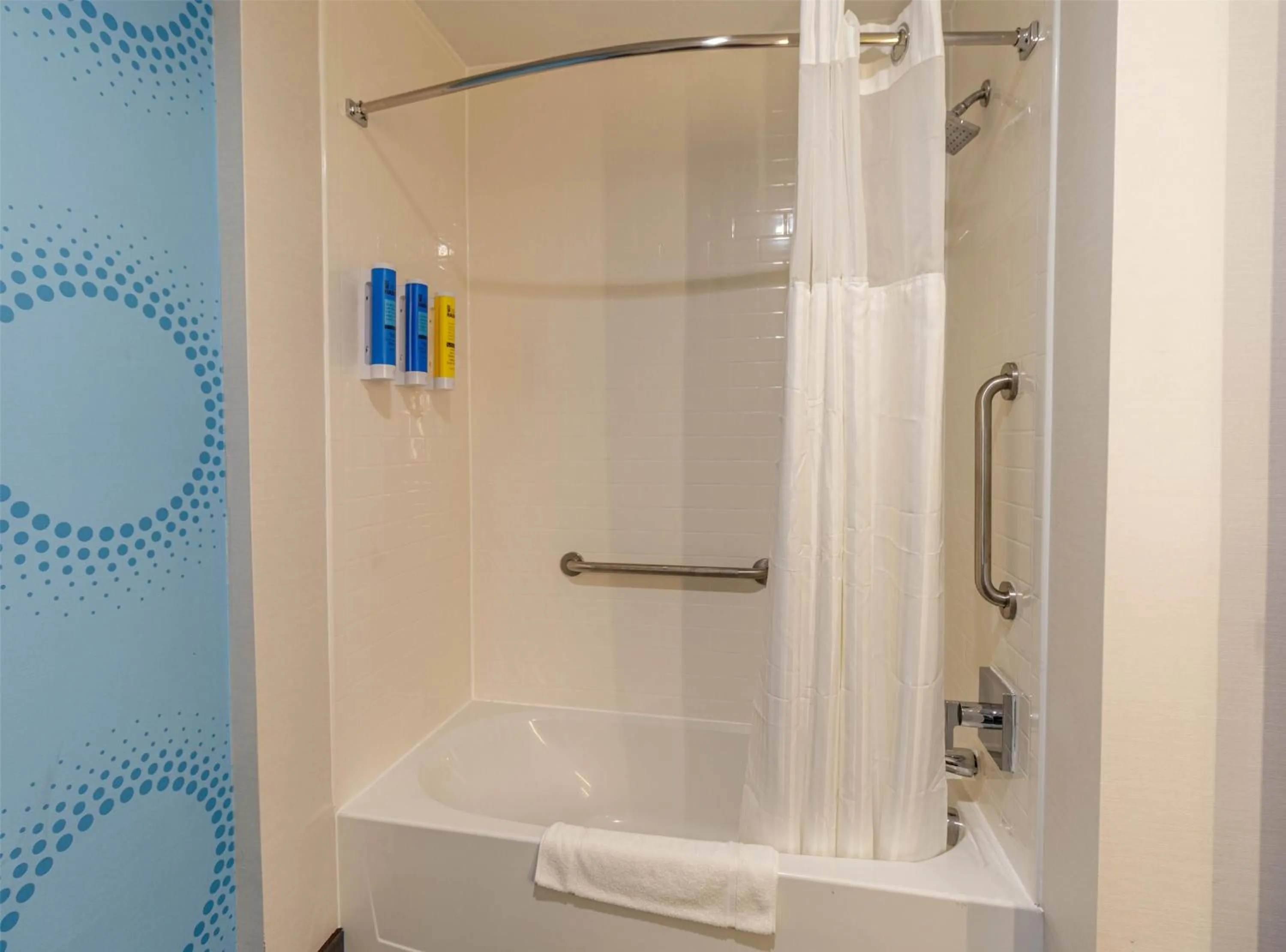 Bathroom in Tru By Hilton Mckinney