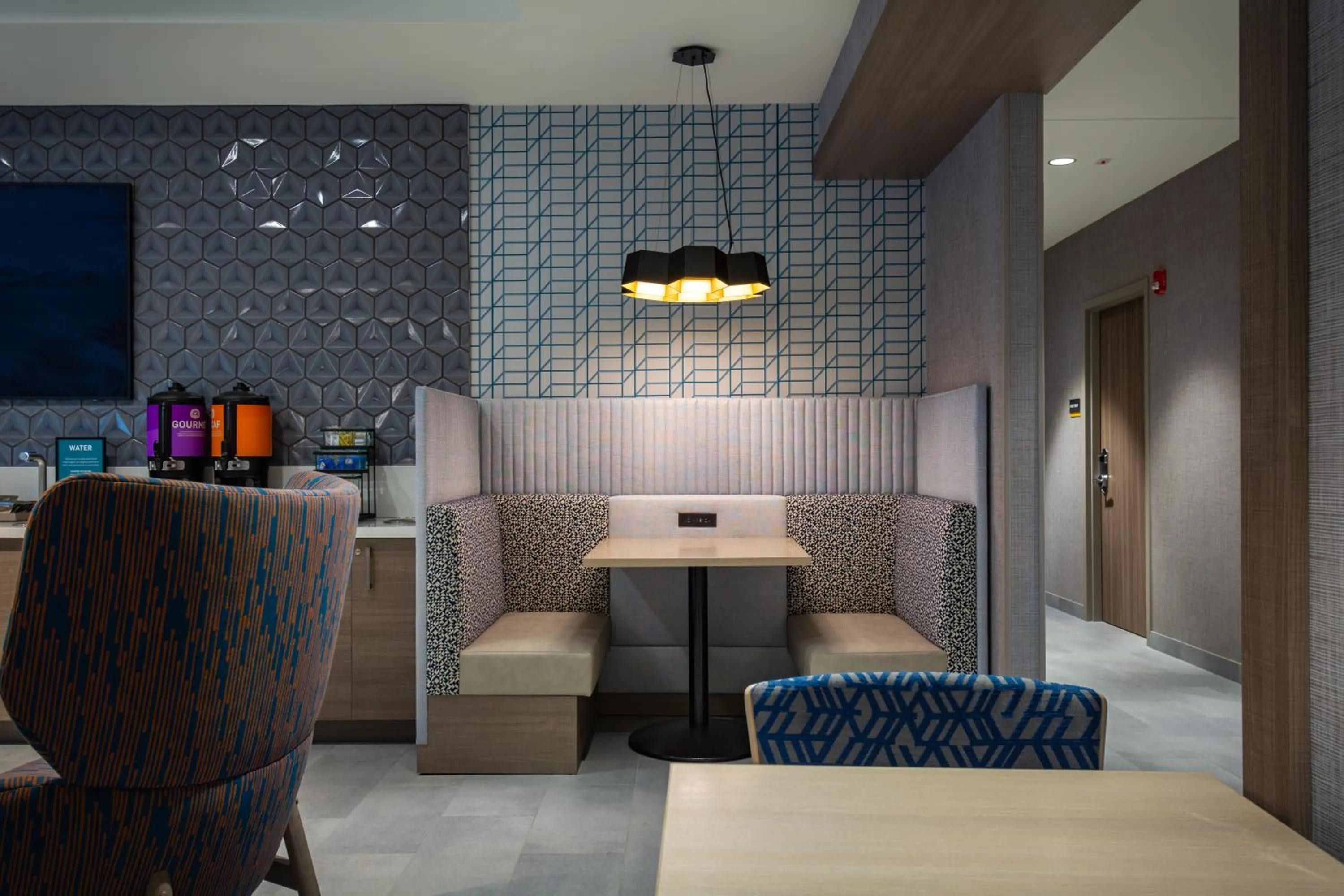 Communal lounge/ TV room in Home2 Suites By Hilton Boone