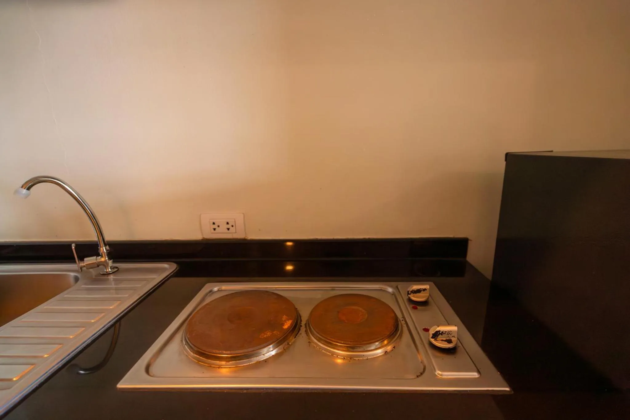 Kitchen or kitchenette in Golden Manora Hotel Bangtao Beach Phuket