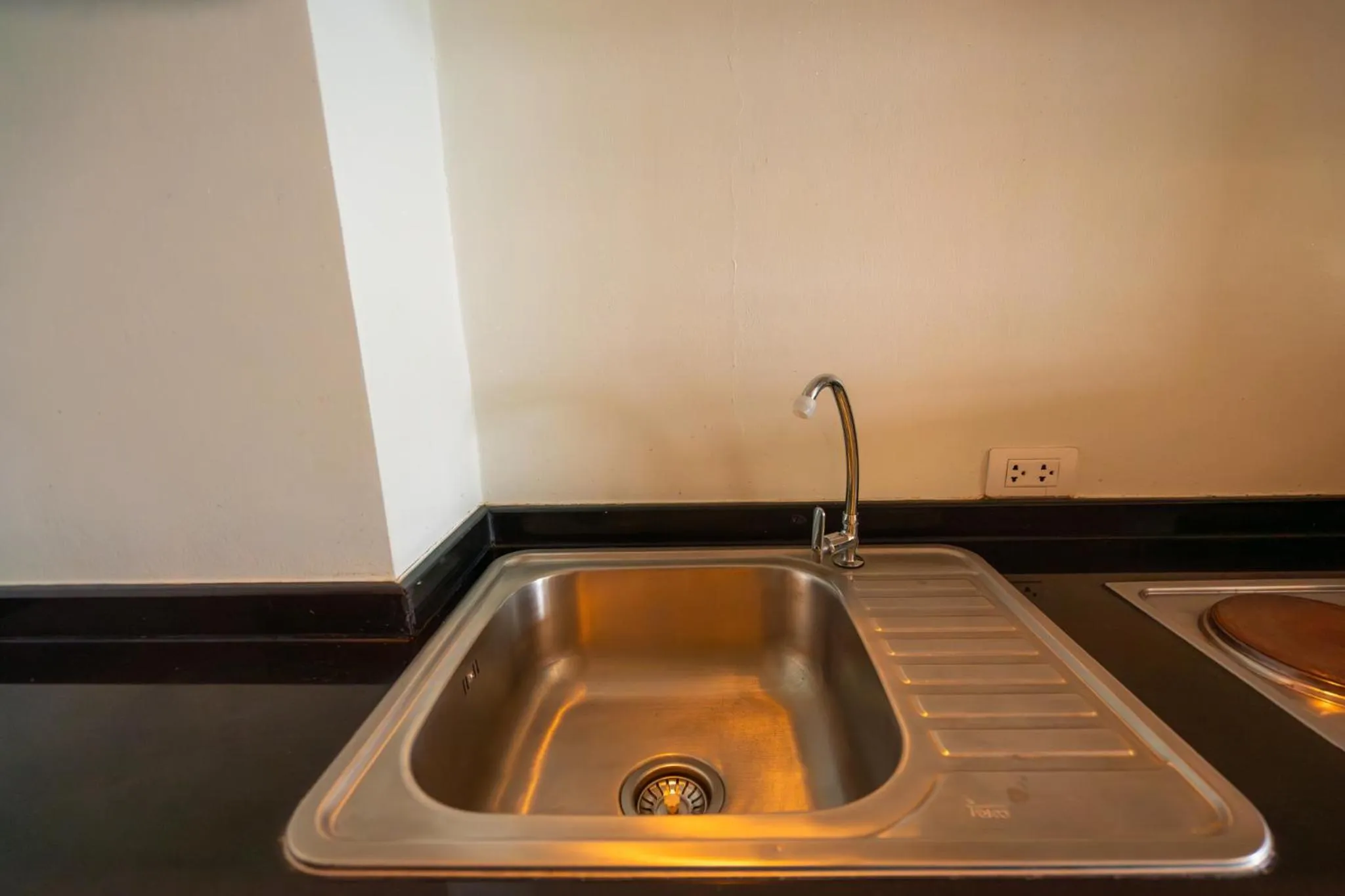 Kitchen or kitchenette in Golden Manora Hotel Bangtao Beach Phuket