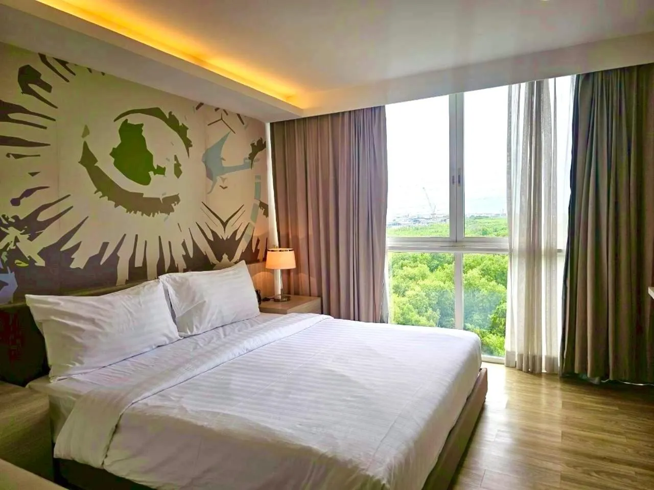 Bed in The Idle Hotel and Residence