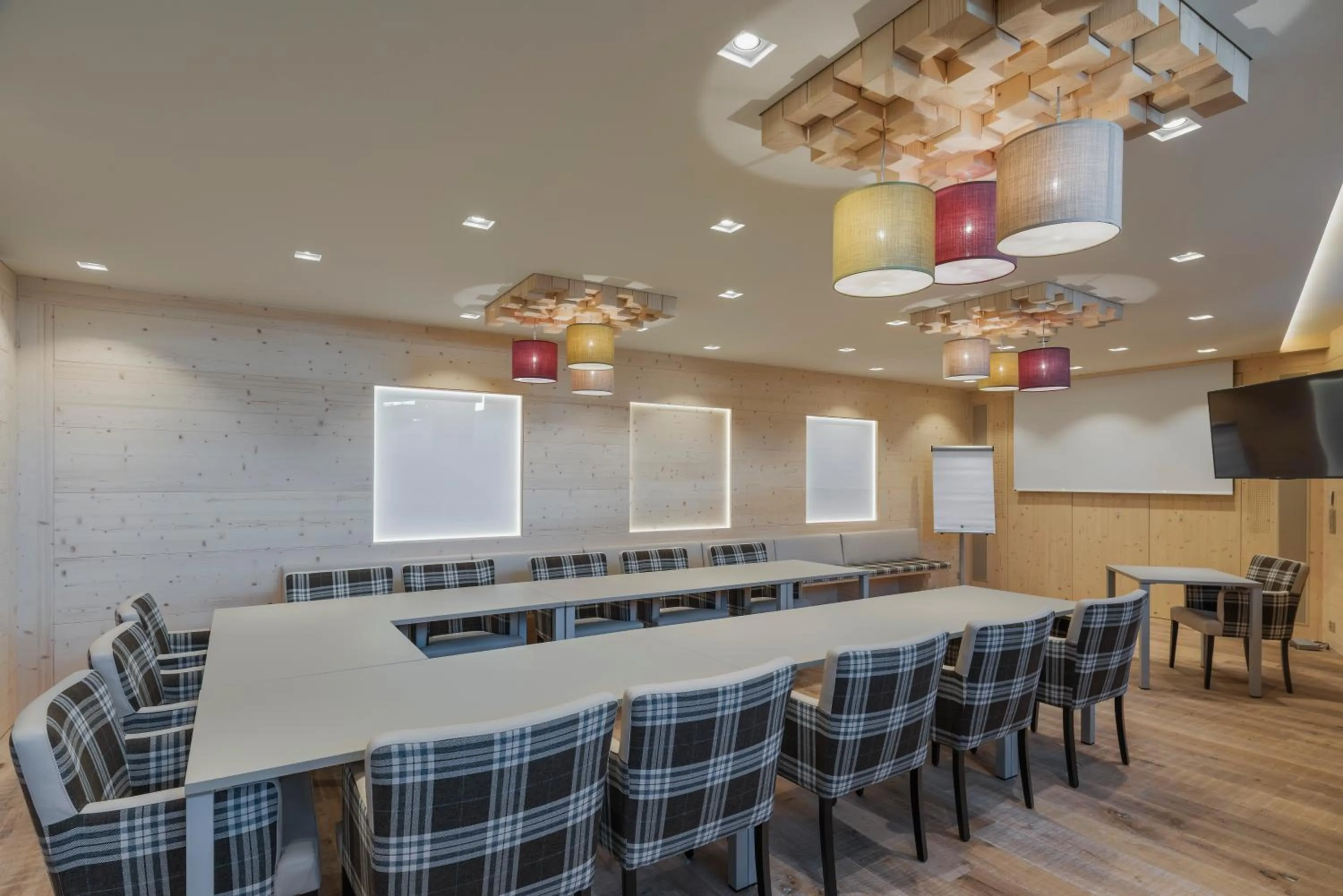 Communal lounge/ TV room in Caschu Alp Boutique Design Hotel Stoos - adults only