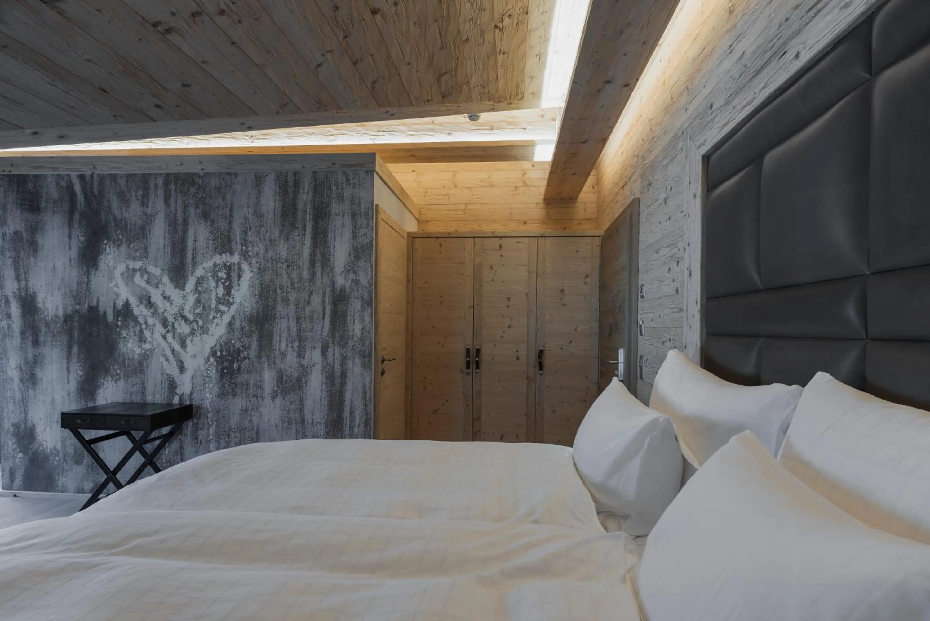 Bed in Caschu Alp Boutique Design Hotel Stoos - adults only