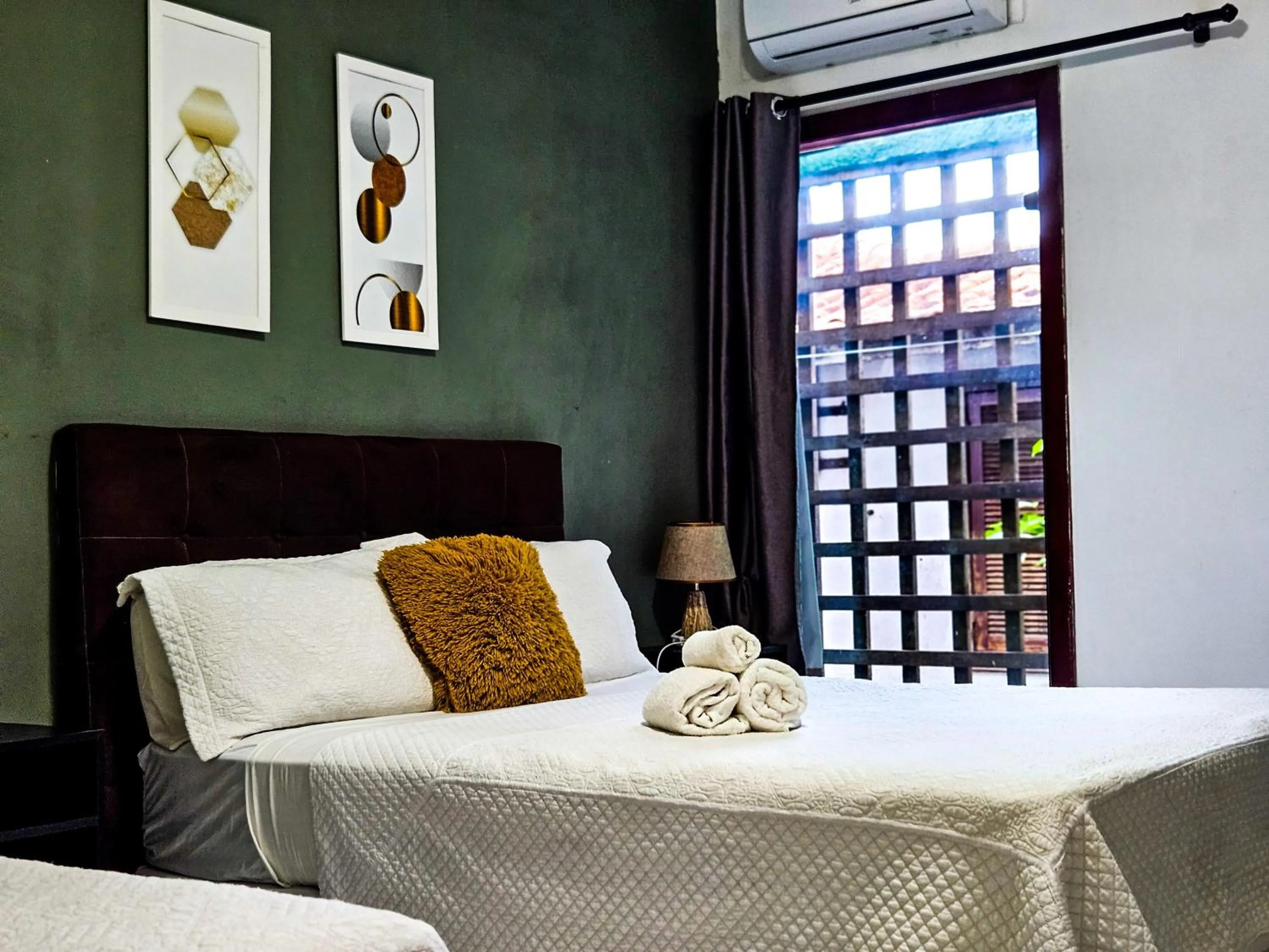 Bed in Pousada Abacateiro