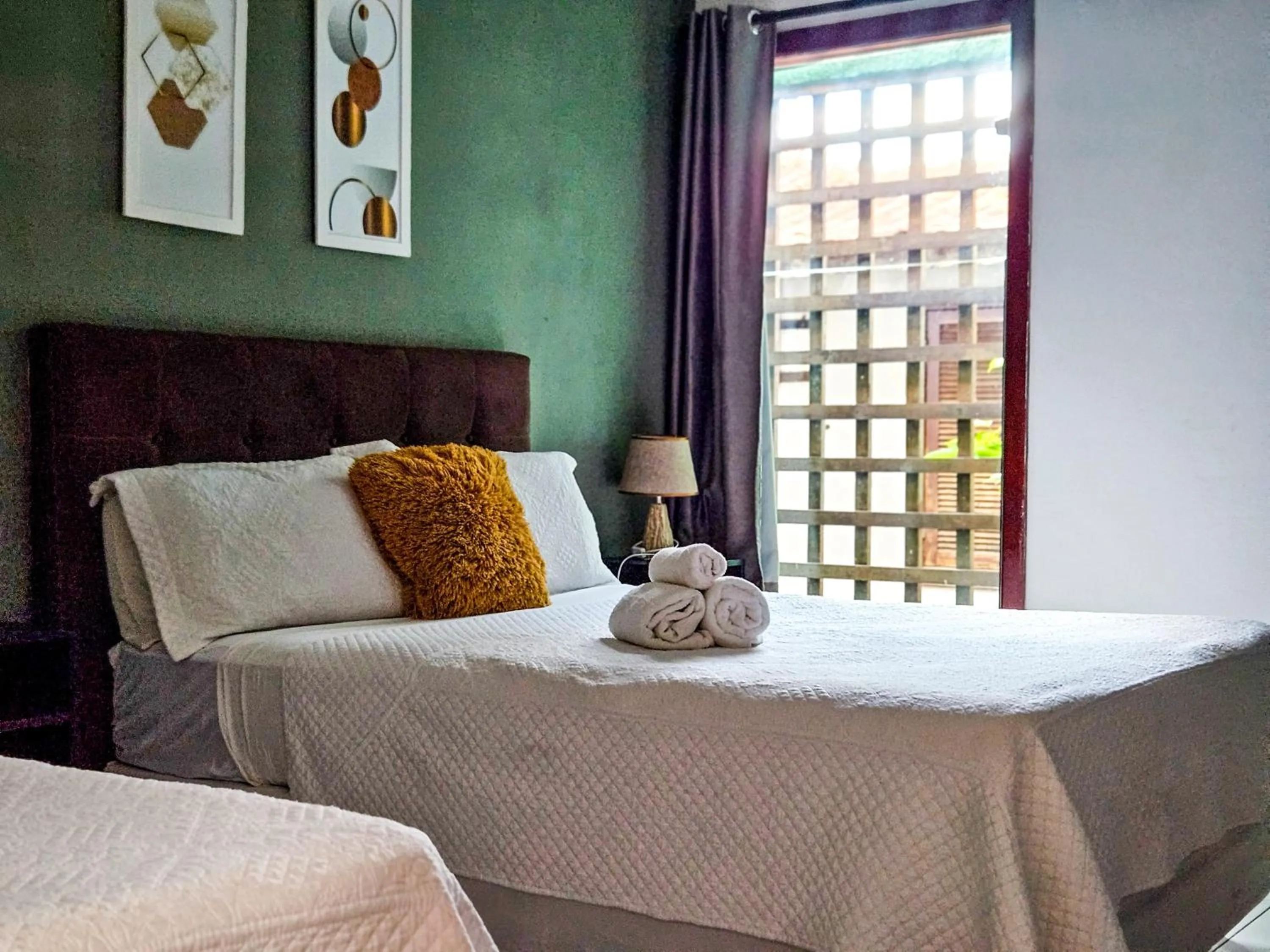 Bed in Pousada Abacateiro