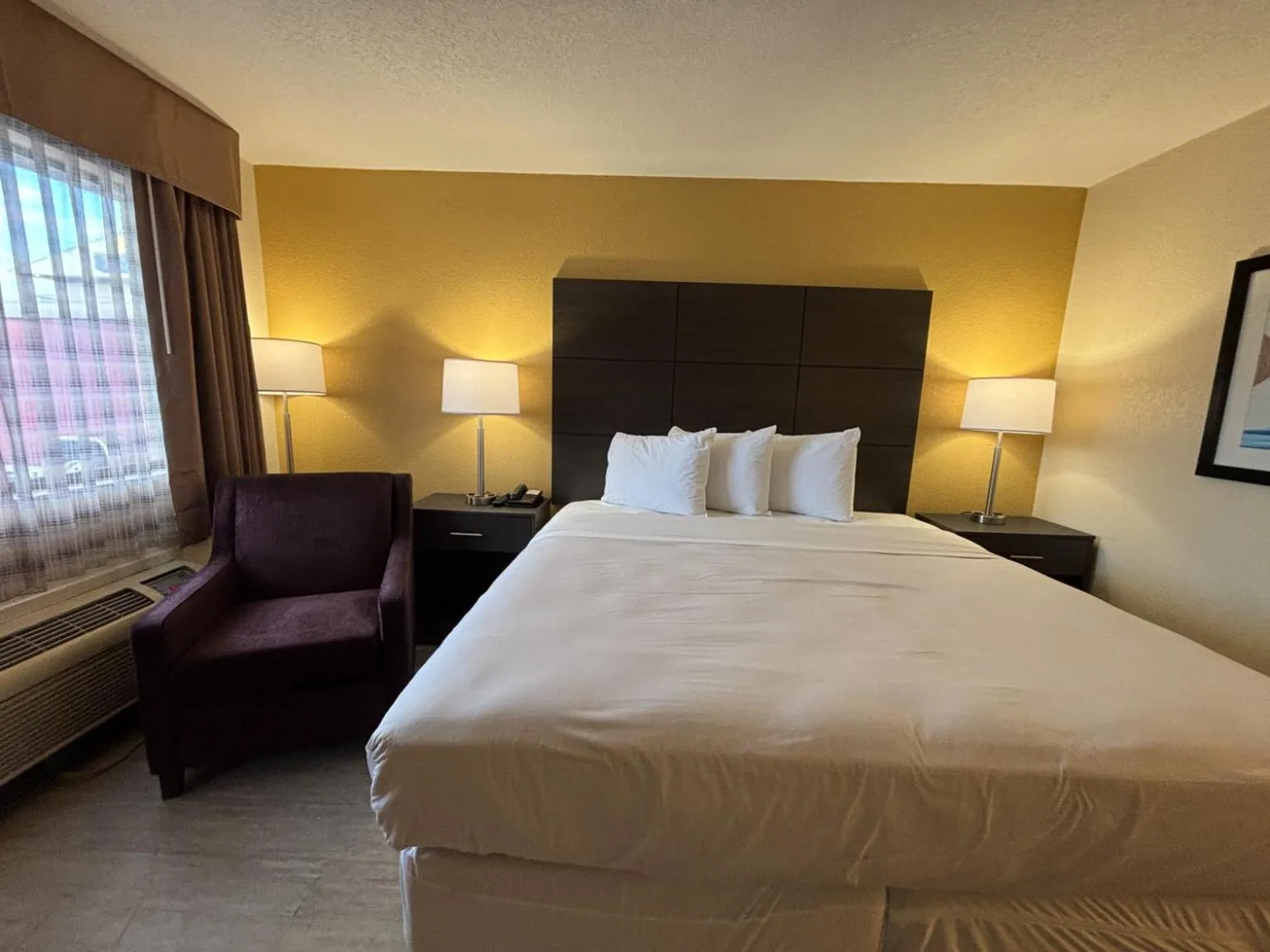 Photo of the whole room, Bed in Studio 6 Suites Charlotte, NC Northlake