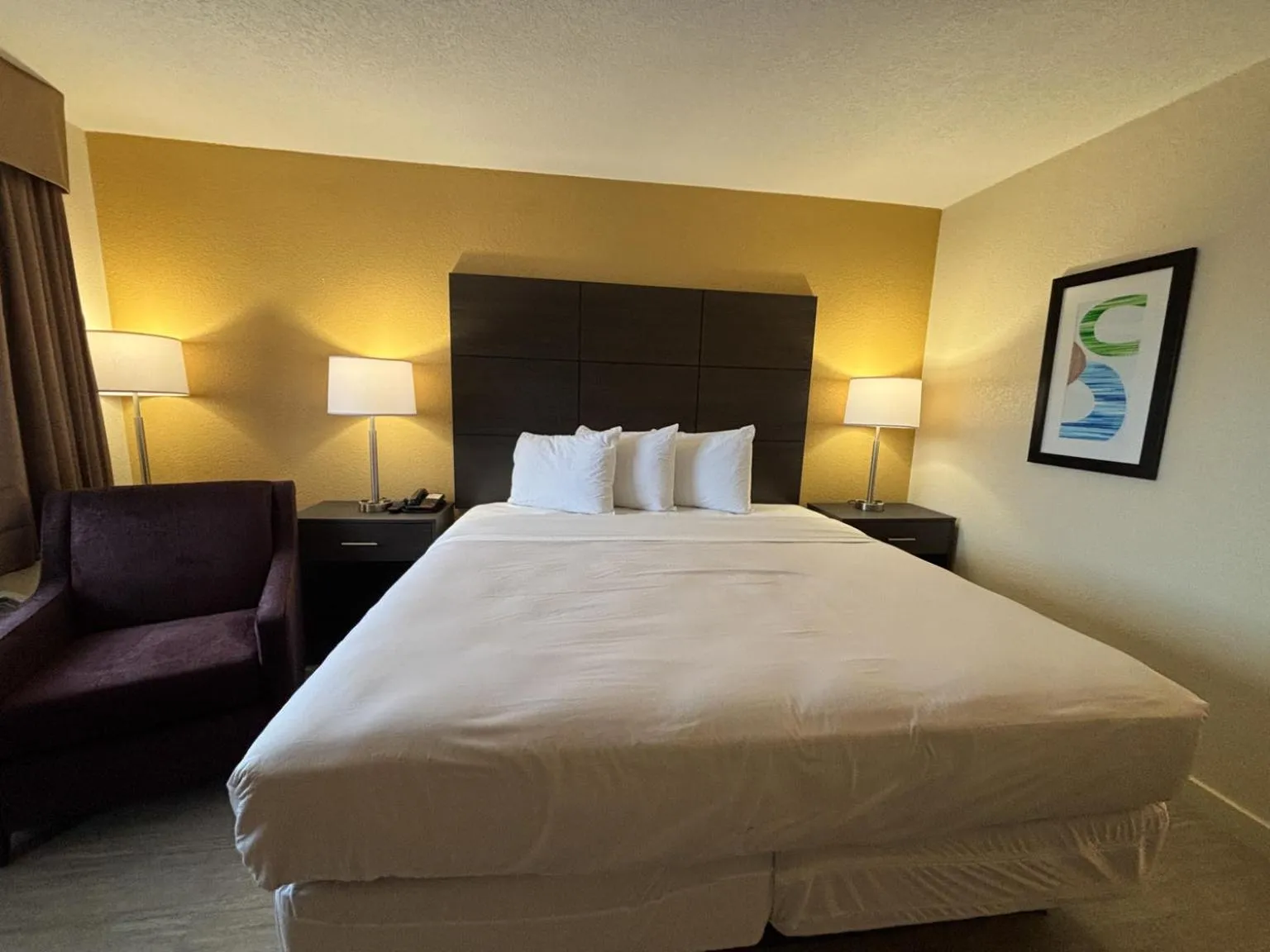 Photo of the whole room, Bed in Studio 6 Suites Charlotte, NC Northlake