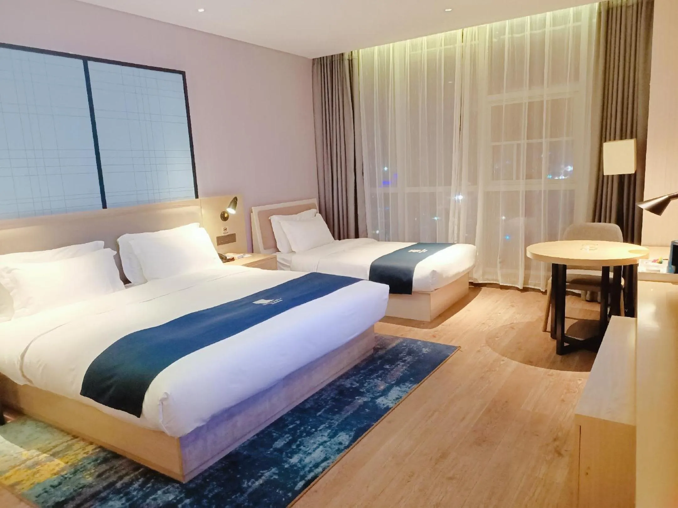 Bed in Echarm Hotel Changsha Huangxing Avenue Airport Store