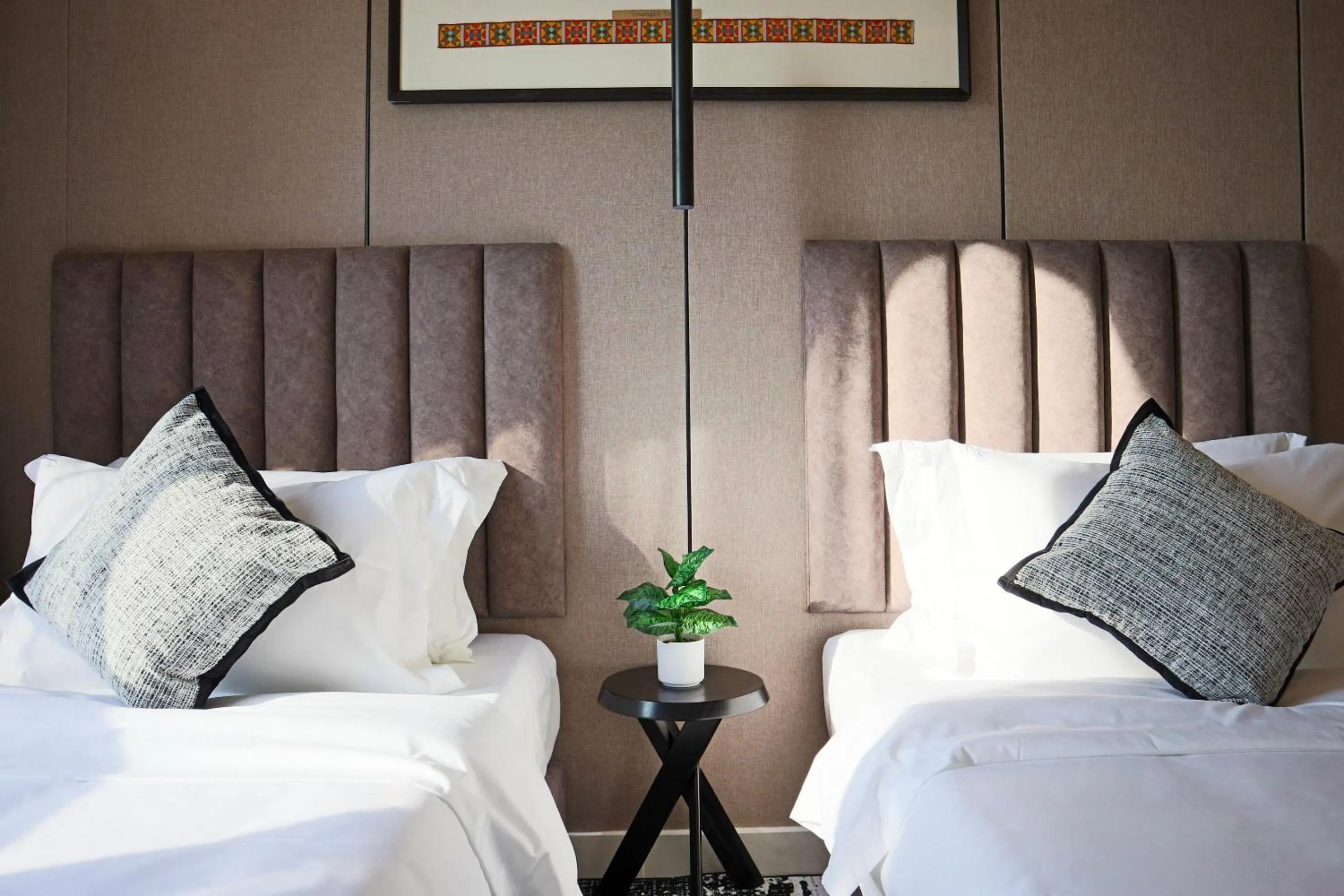 Bed in The SIGAR Hotel at Sutera Bay