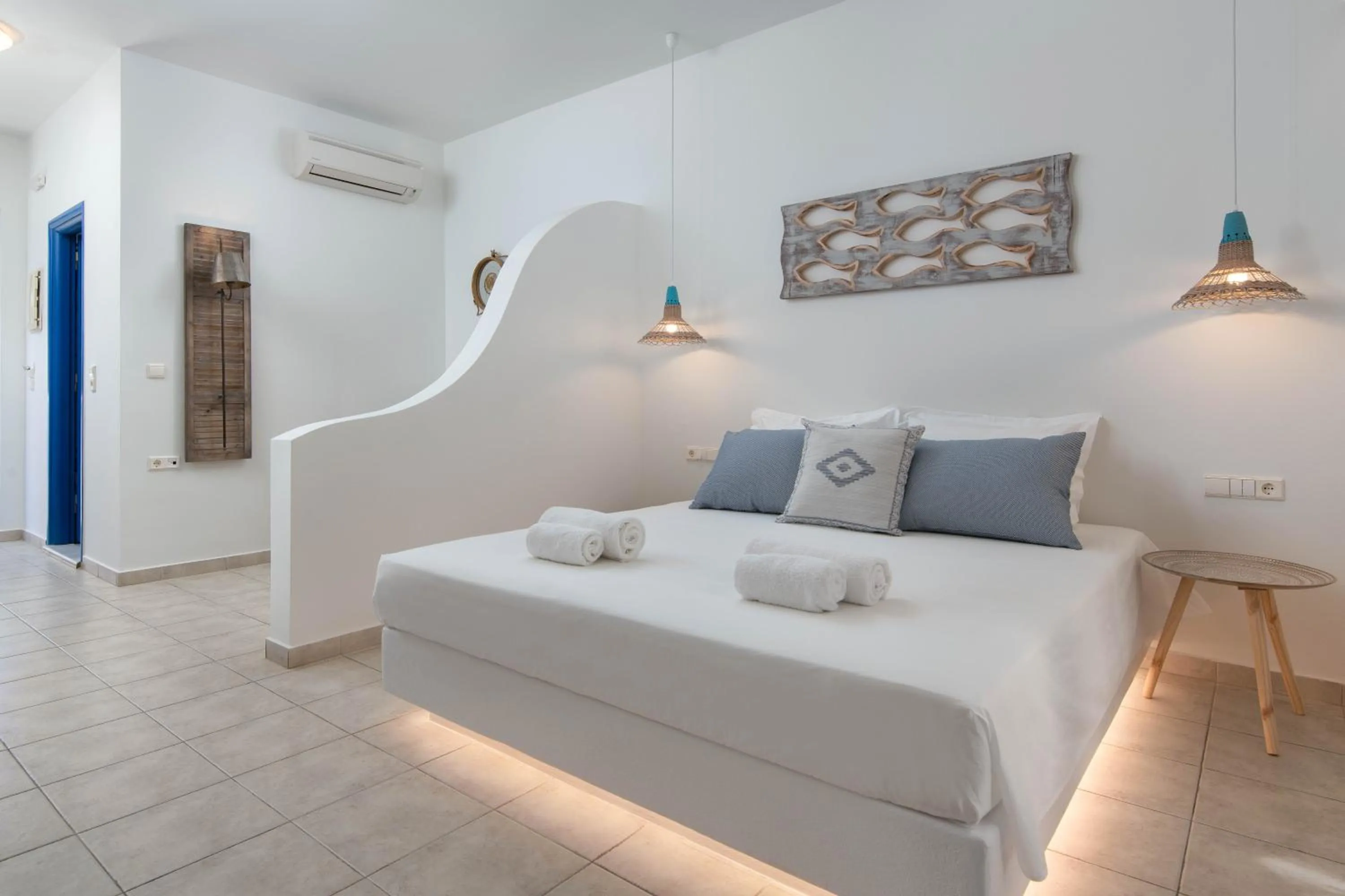 Bed in 'Lindian Myth' Sea View Studios