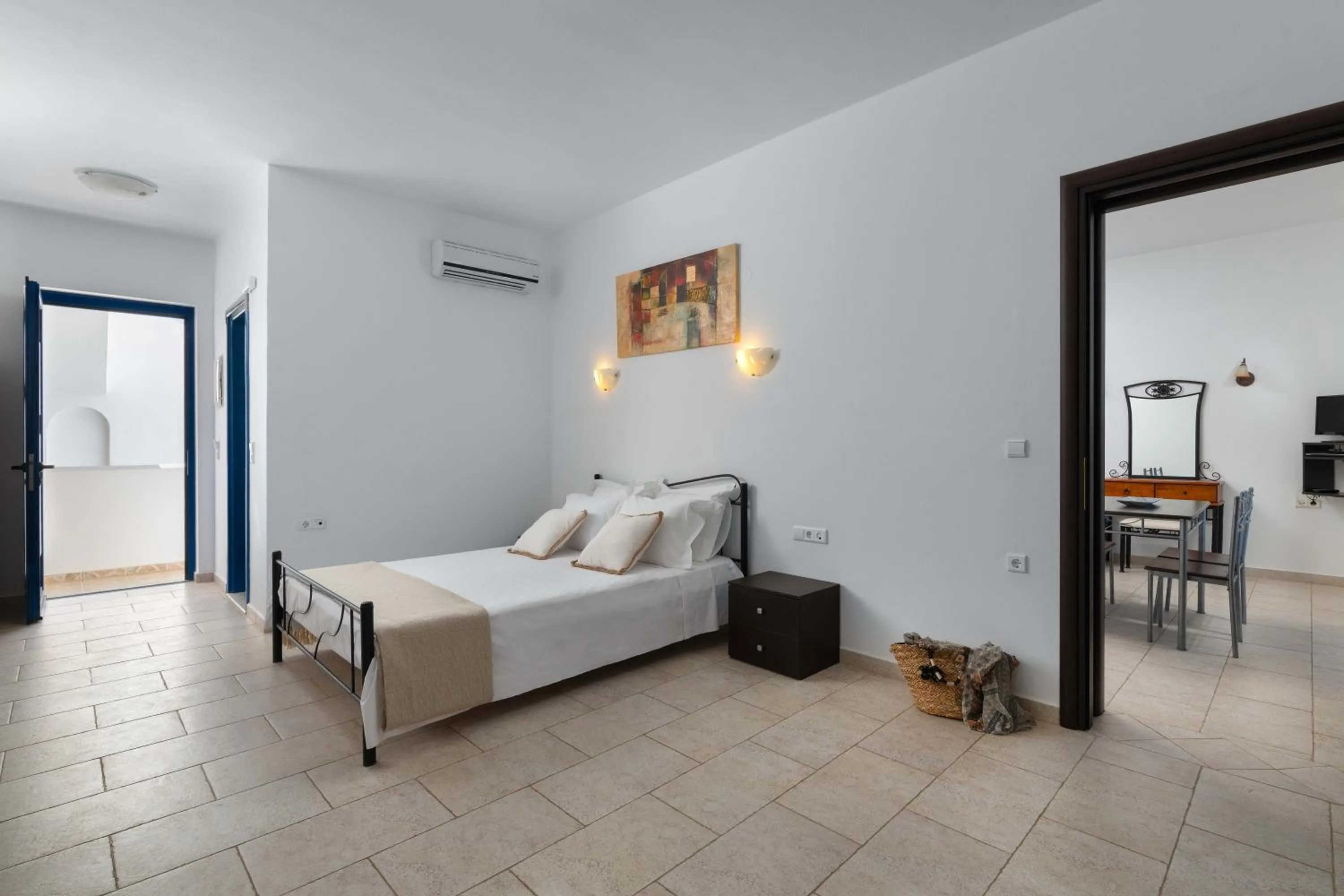 Bed in 'Lindian Myth' Sea View Studios