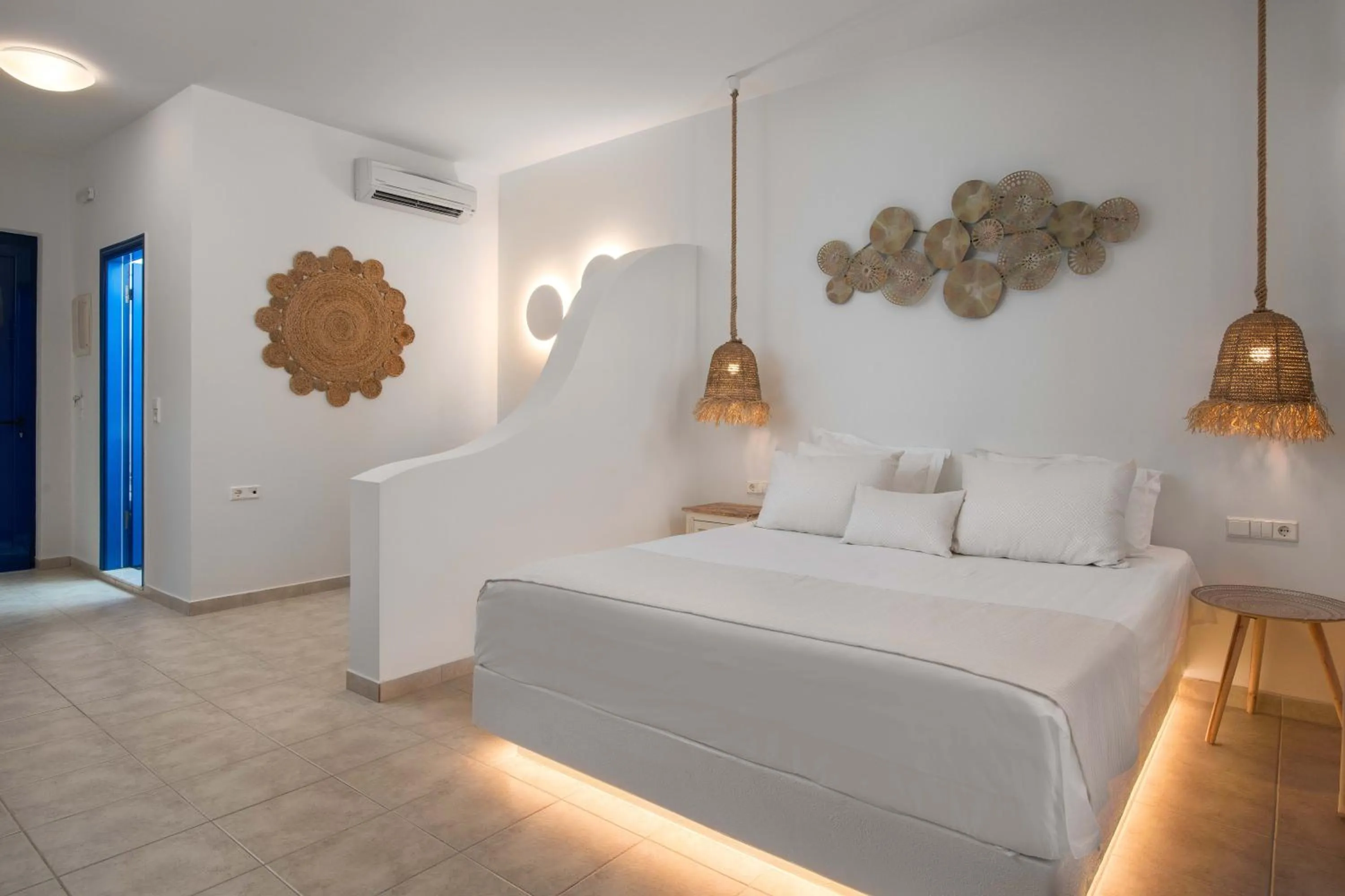 Bed in 'Lindian Myth' Sea View Studios