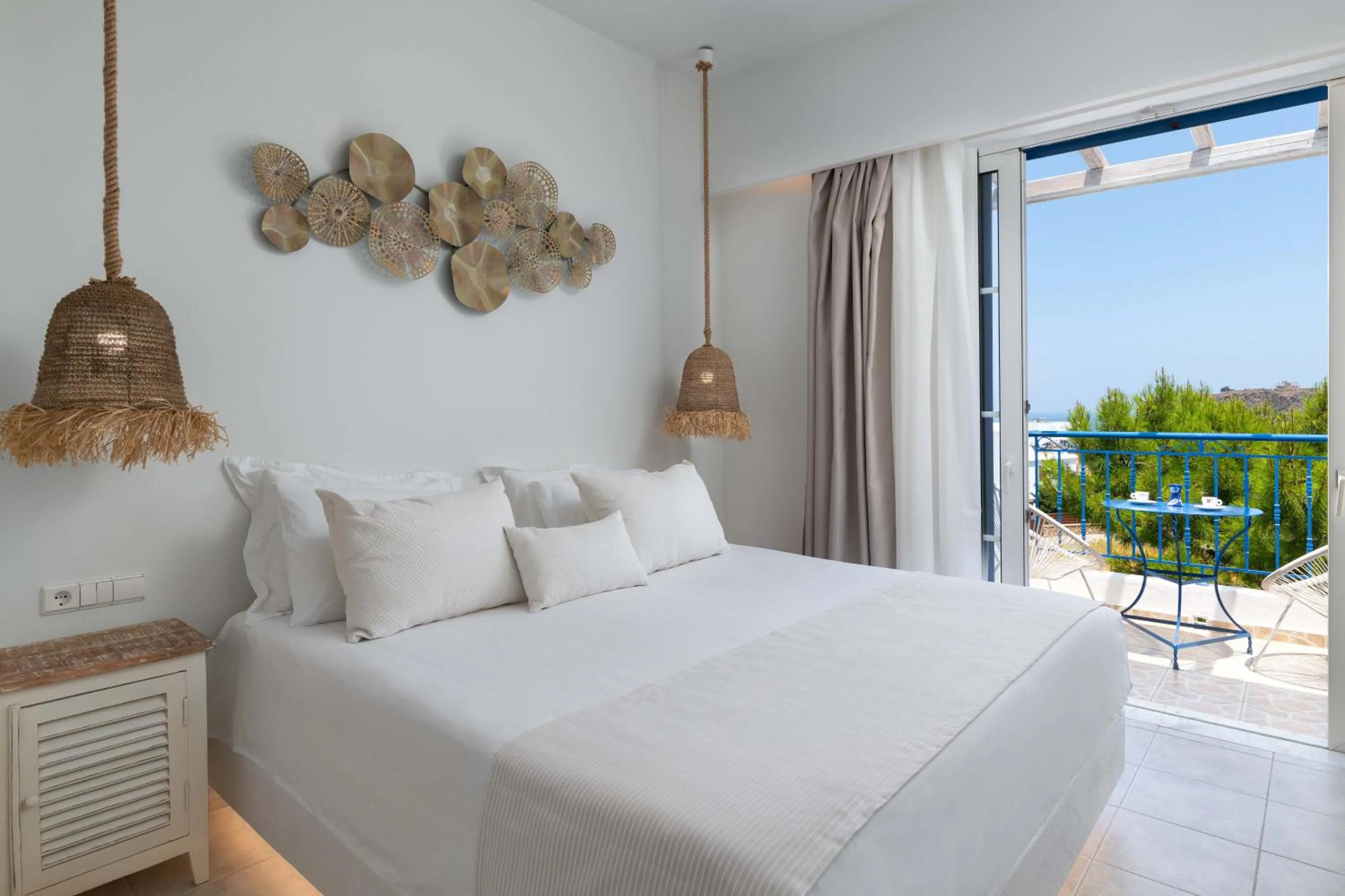 Bed in 'Lindian Myth' Sea View Studios