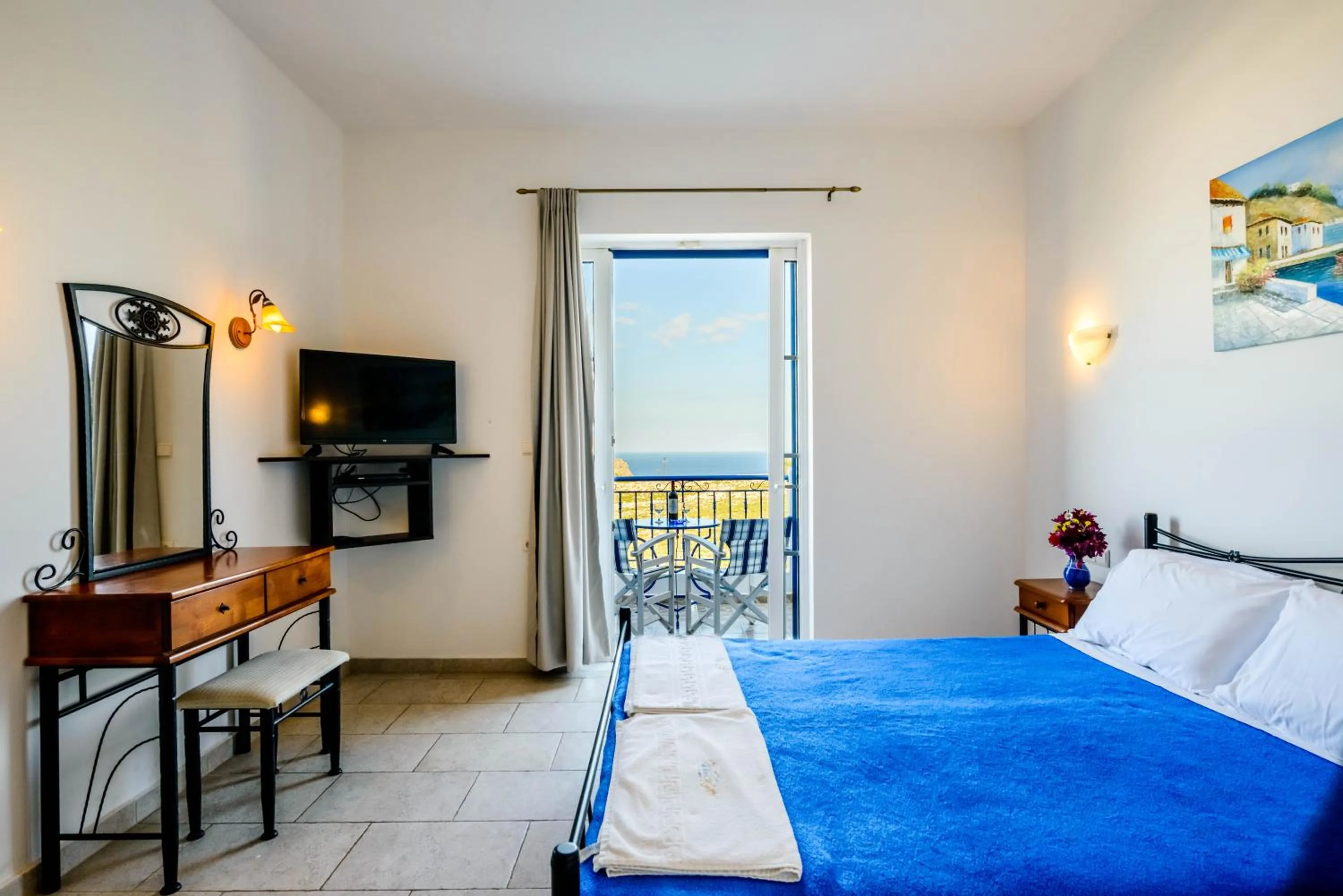 Bed in 'Lindian Myth' Sea View Studios