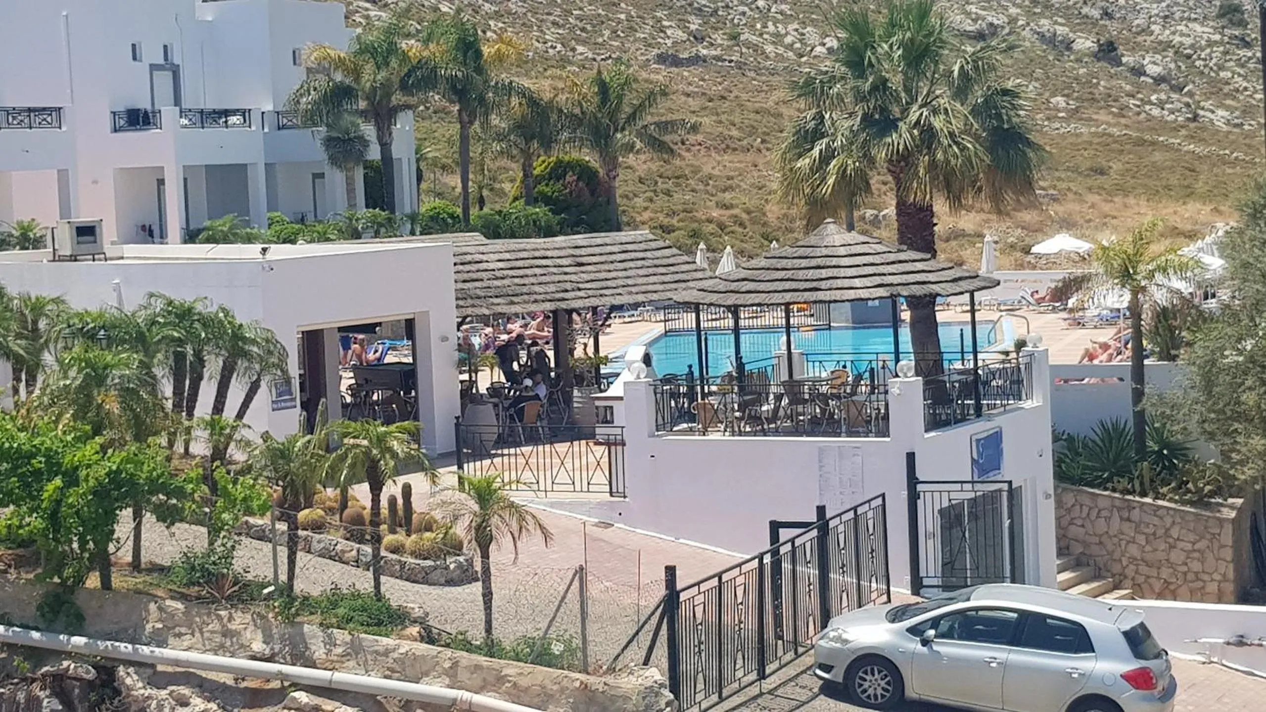 Pool view in 'Lindian Myth' Sea View Studios