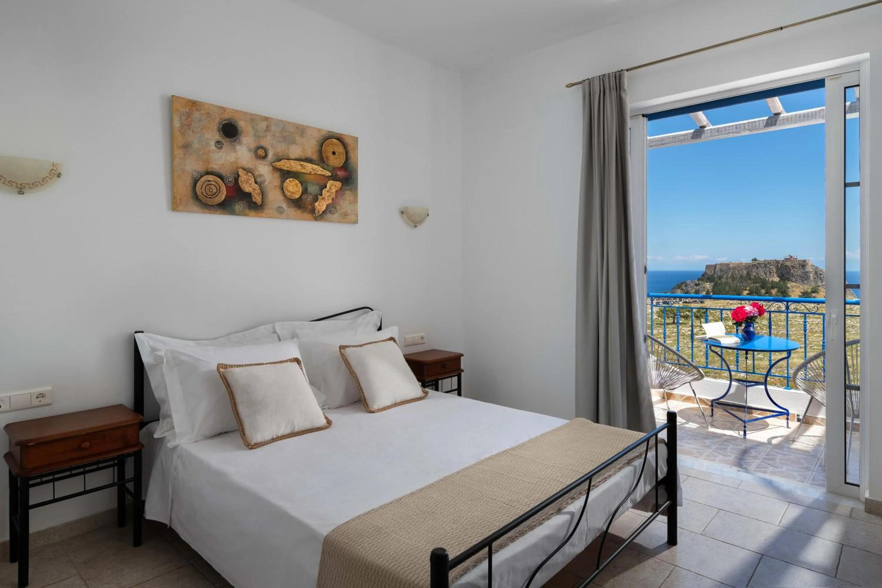 Bed in 'Lindian Myth' Sea View Studios