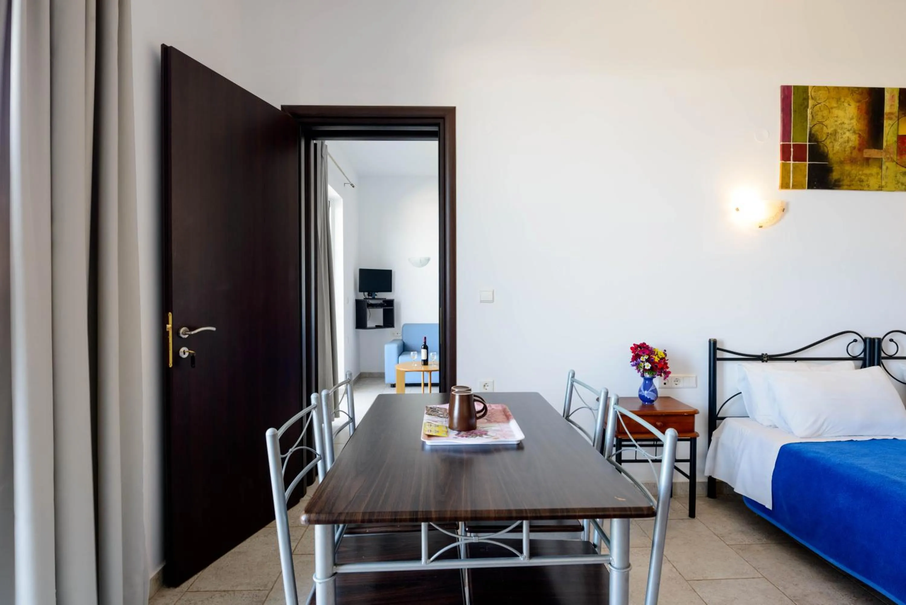 Bed in 'Lindian Myth' Sea View Studios