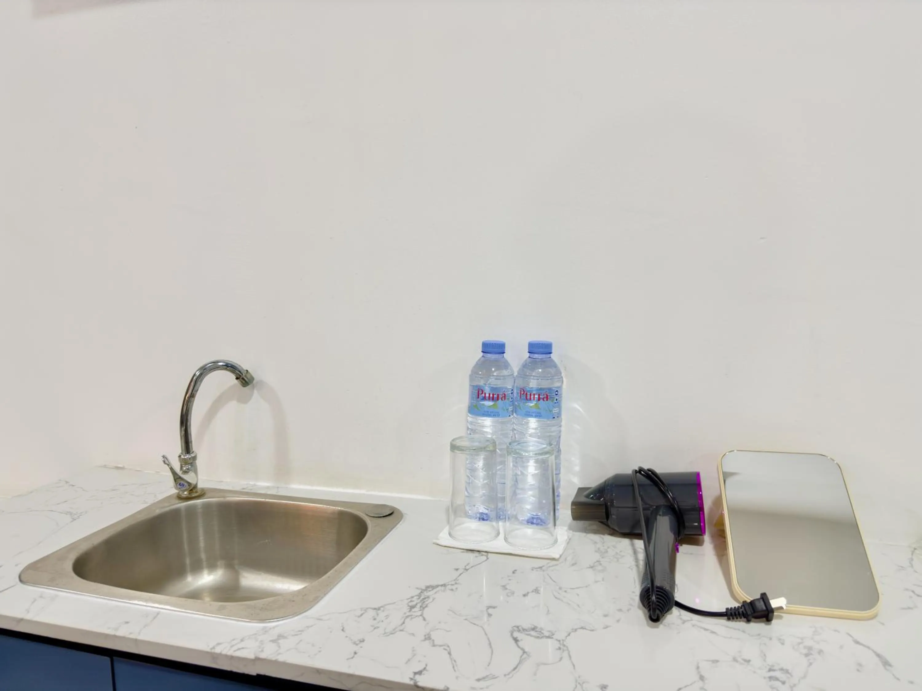 Bedroom in Breezewood Bangkok Hotel