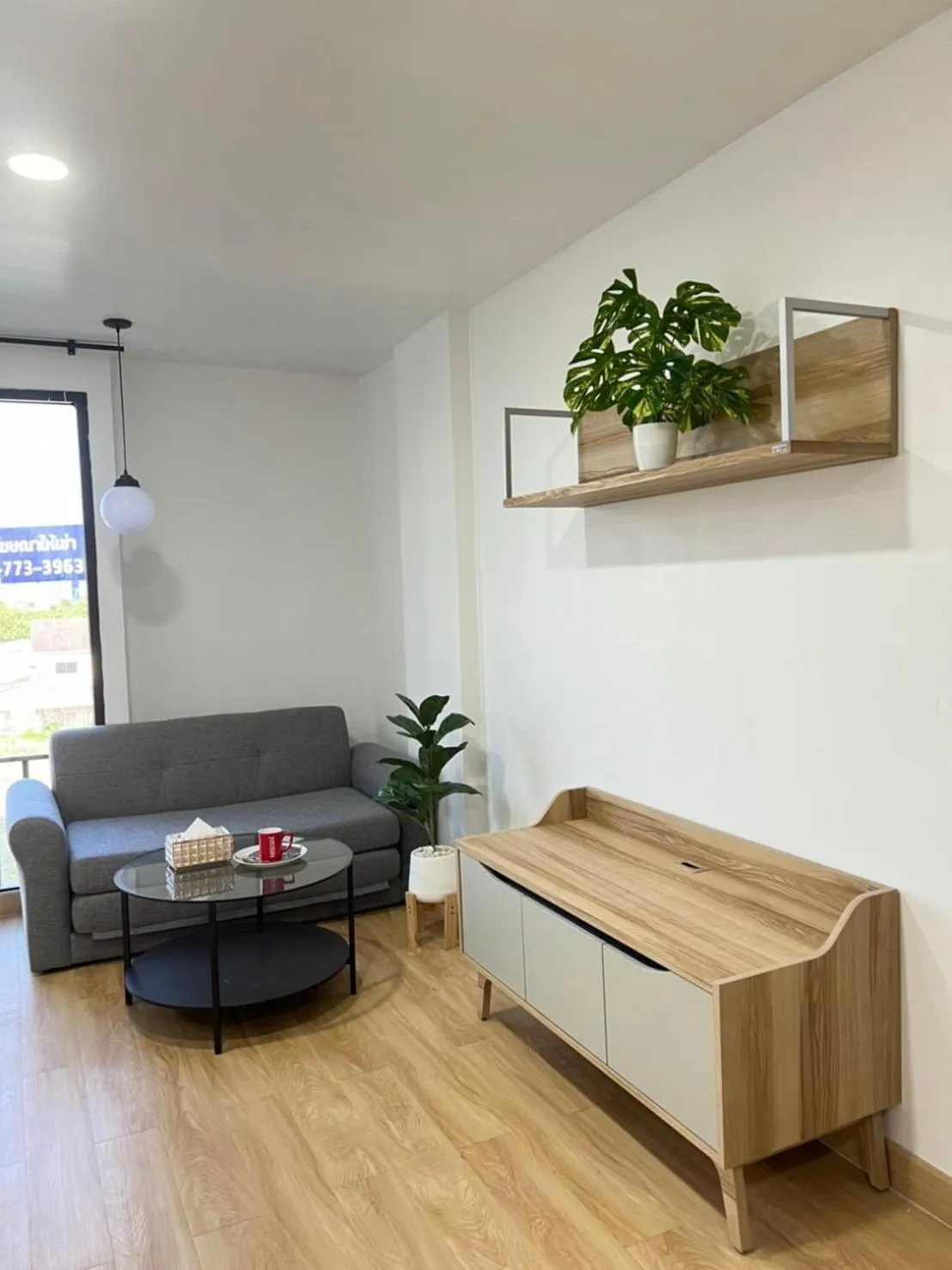 Living room in Breezewood Bangkok Hotel